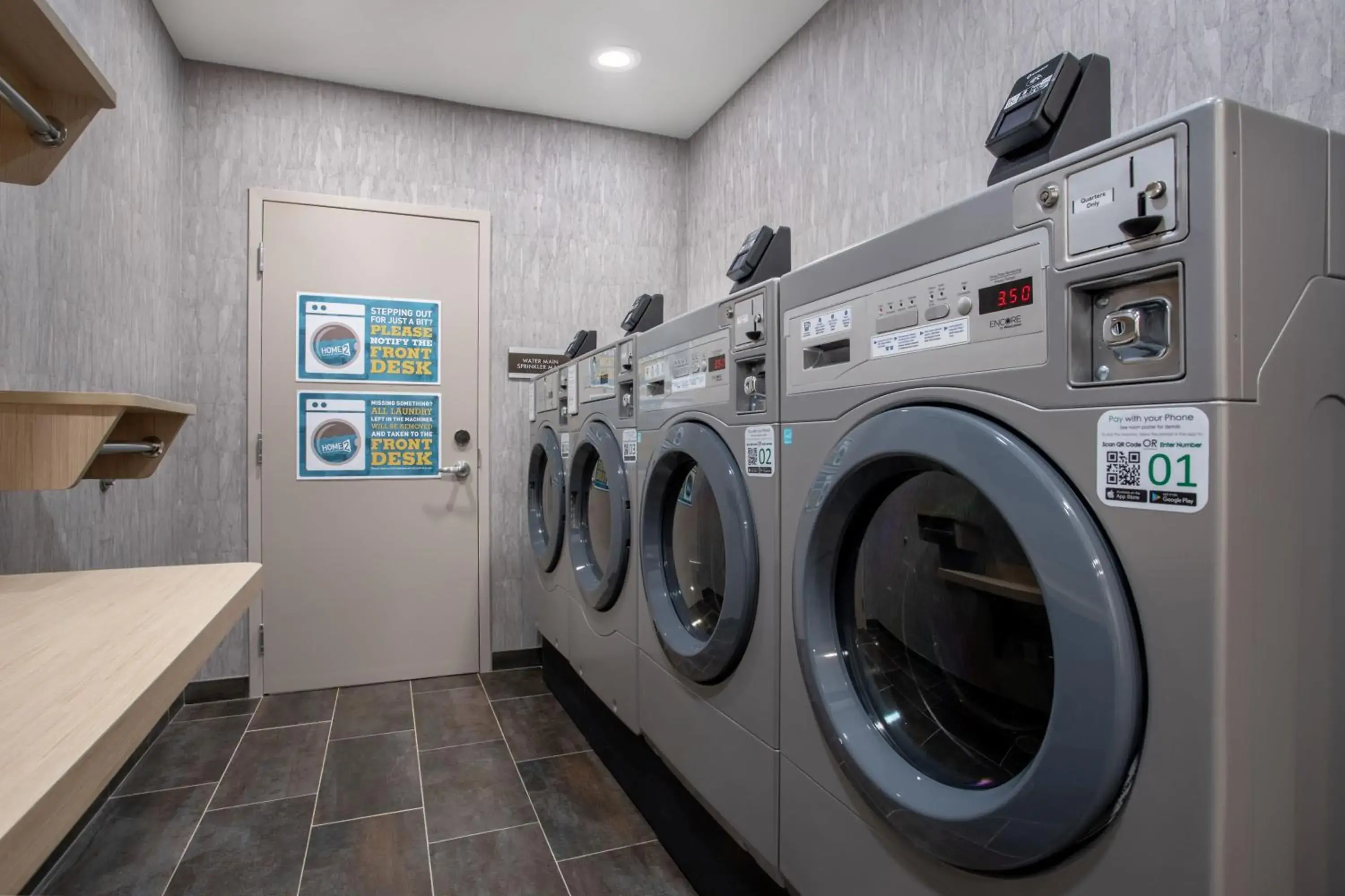 washing machine in Home2 Suites By Hilton Calhoun