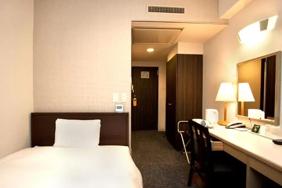 Bed in Smile Hotel Asakusa