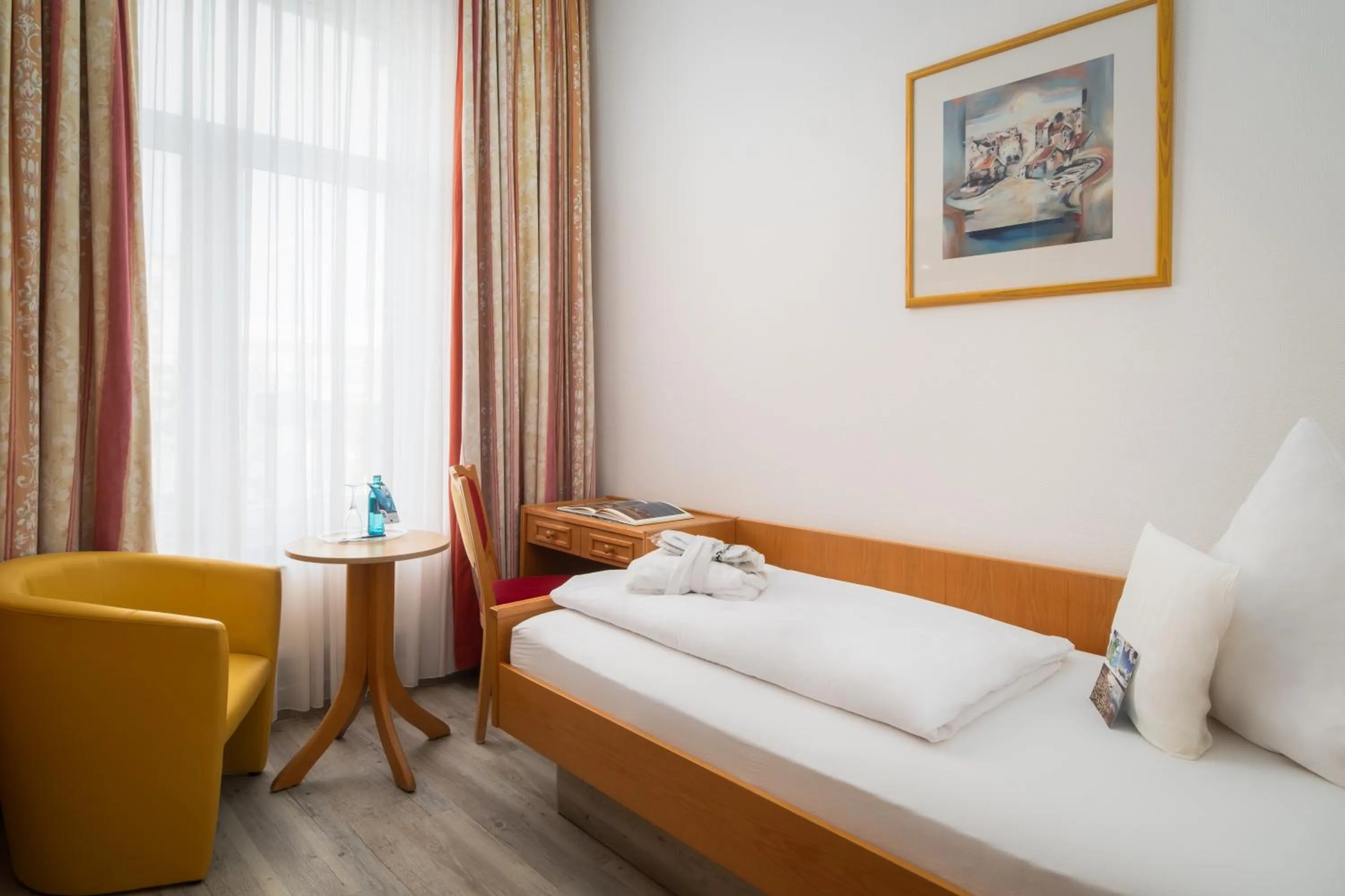 Photo of the whole room, Bed in Nordsee Hotel Borkum