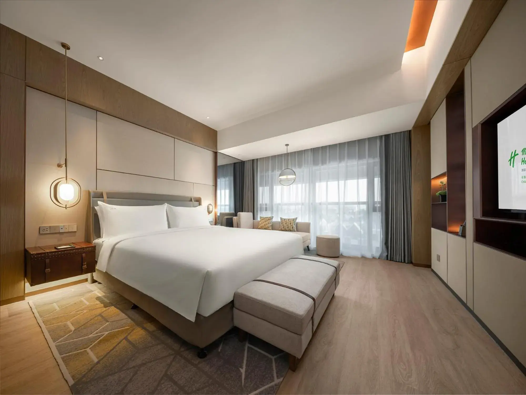 Bed in Holiday Inn Changchun Jingyue, an IHG Hotel