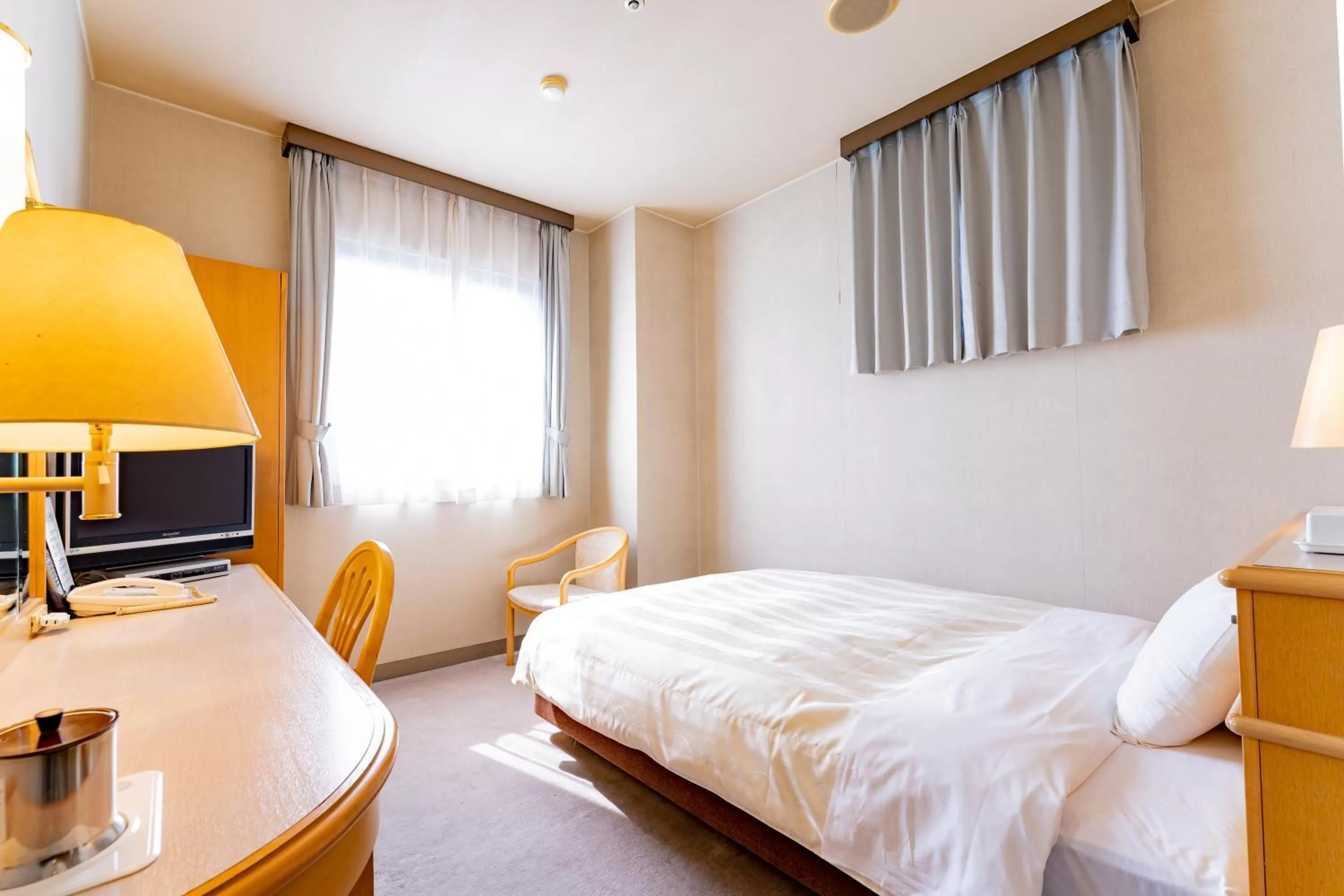 Bed in Oyama Palace Hotel