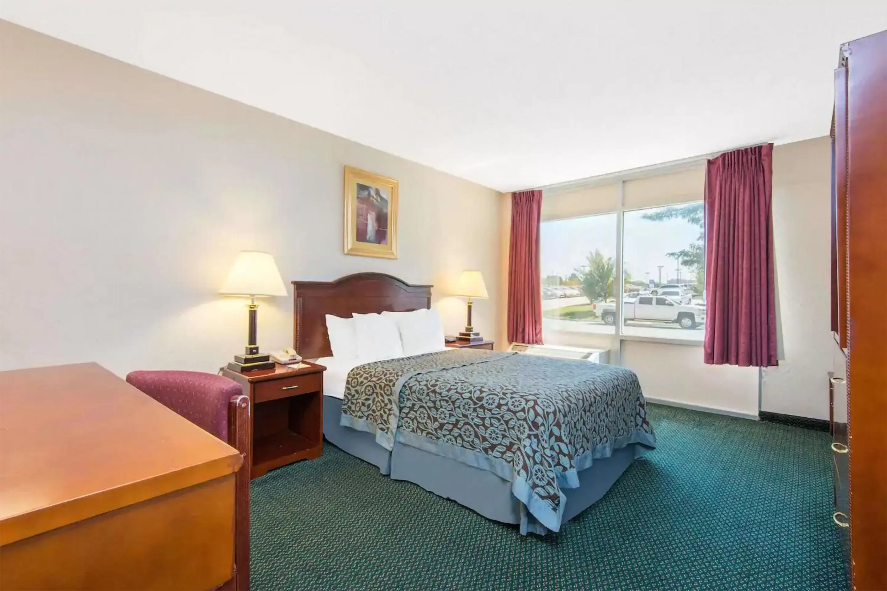 Bed in Blue Way Inn & Suites Wichita East