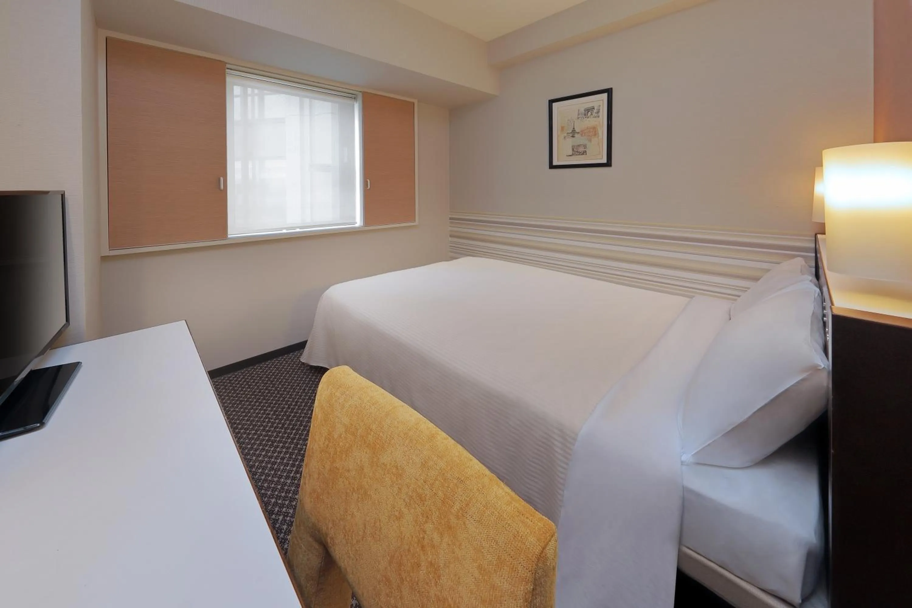 Bed in Keio Presso Inn Shinjuku