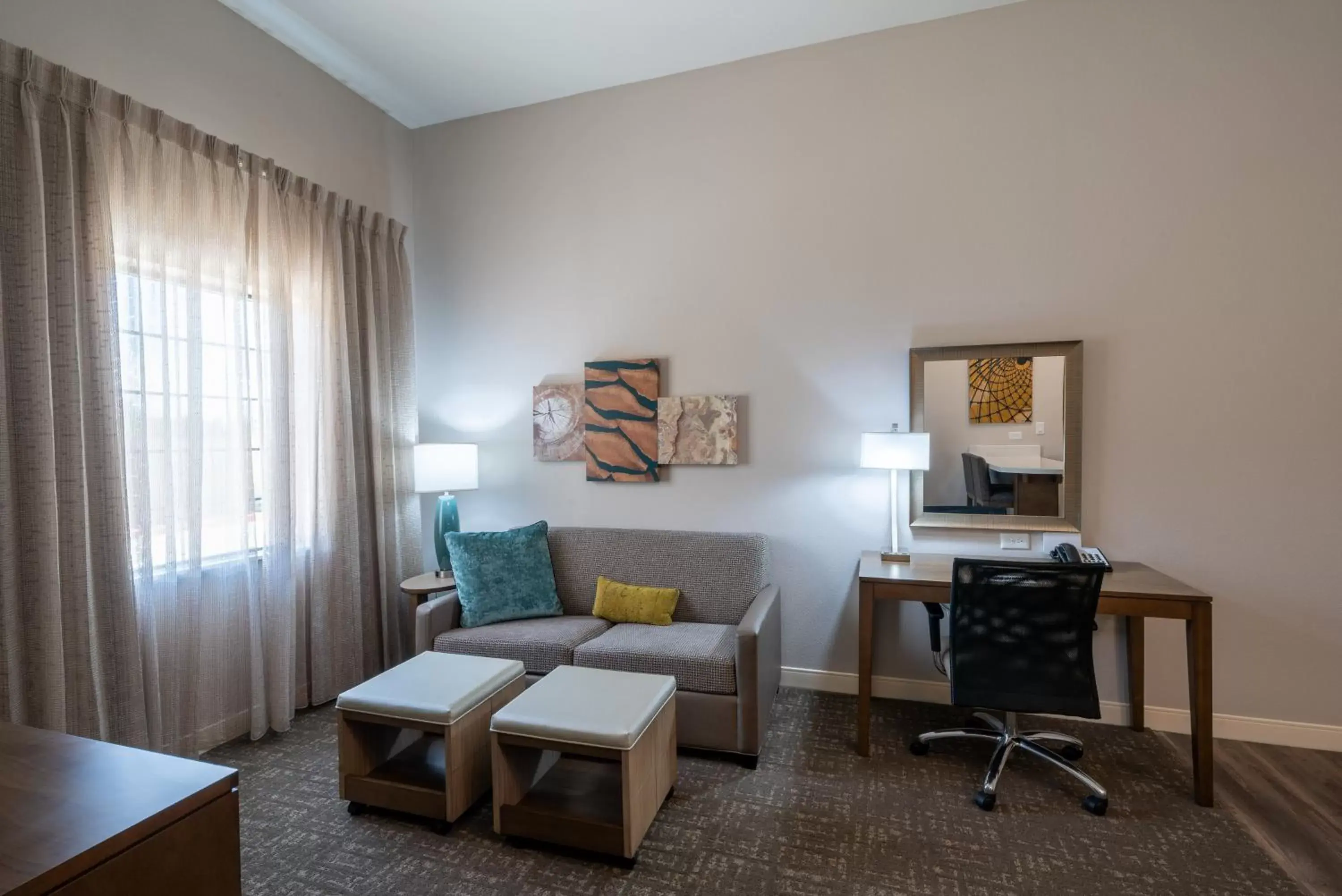 Photo of the whole room, Seating Area in Staybridge Suites Houston East - Baytown, an IHG Hotel