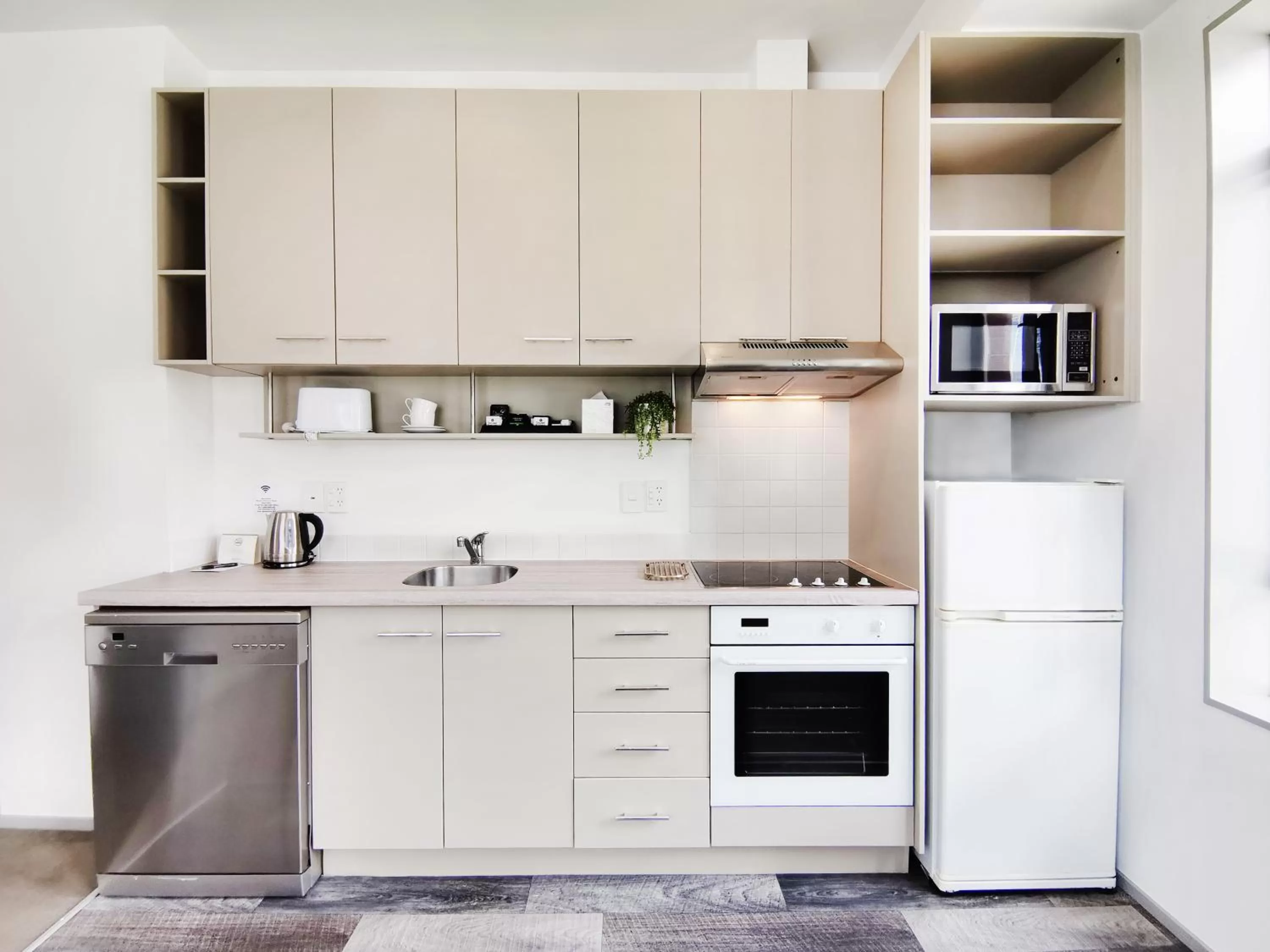 Kitchen or kitchenette in Quest on Eden Auckland CBD Apartment Hotel