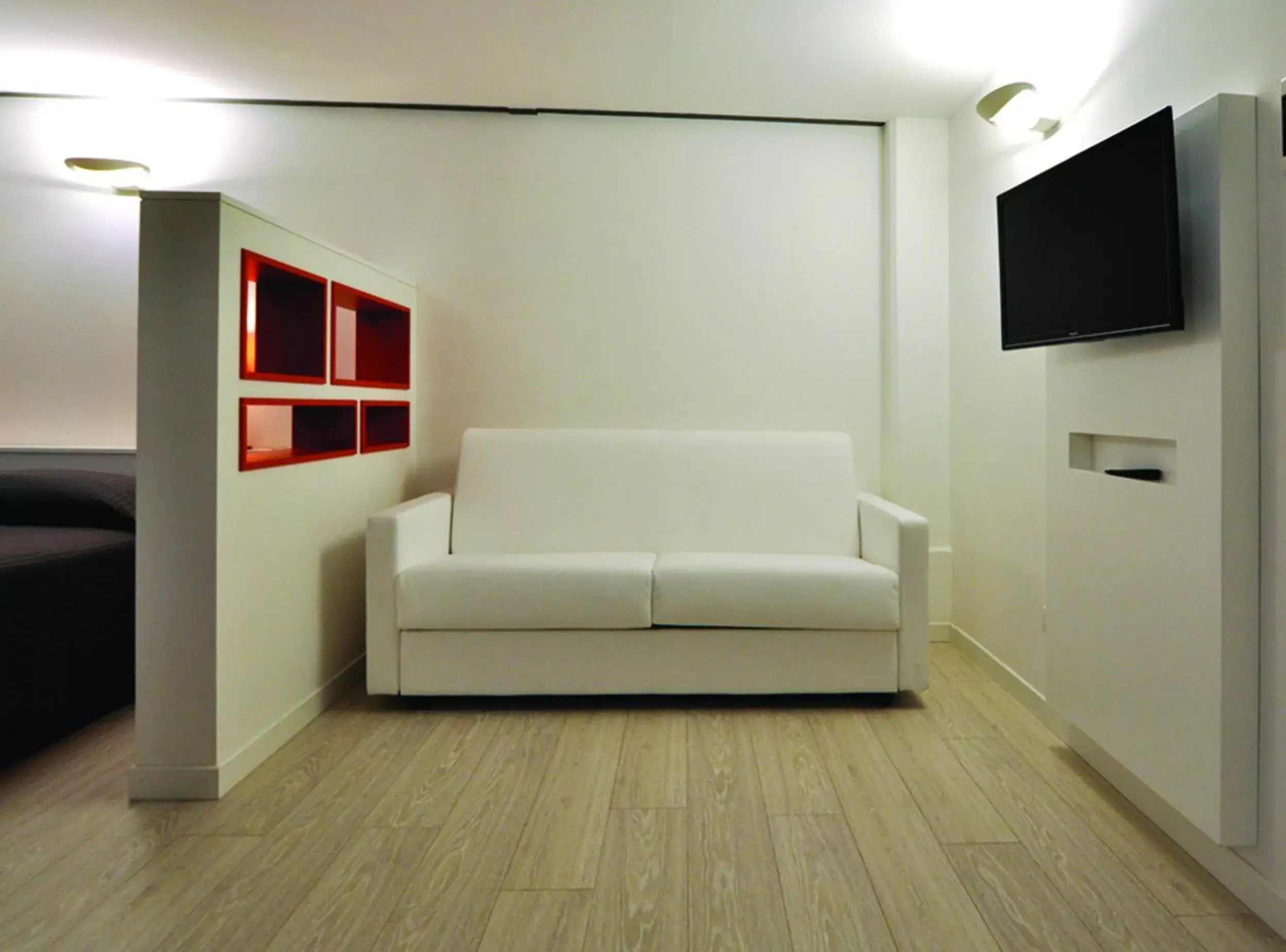 Photo of the whole room, Seating Area in BB Hotels Aparthotel Città Studi