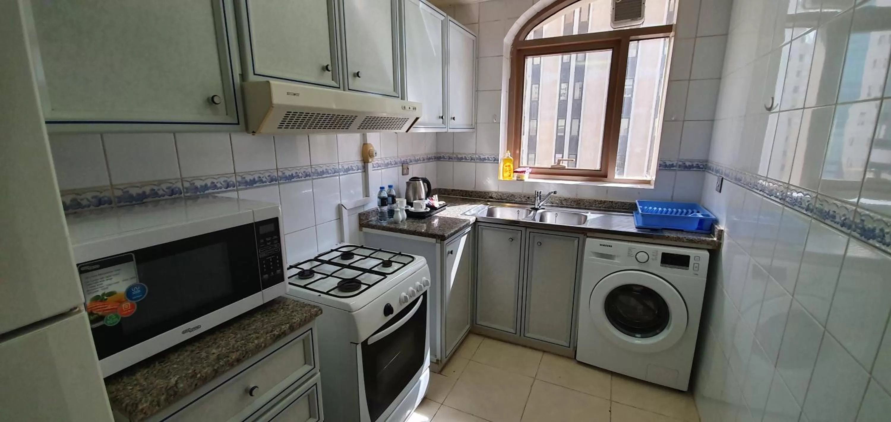 Kitchen or kitchenette in Ivory Hotel Apartments