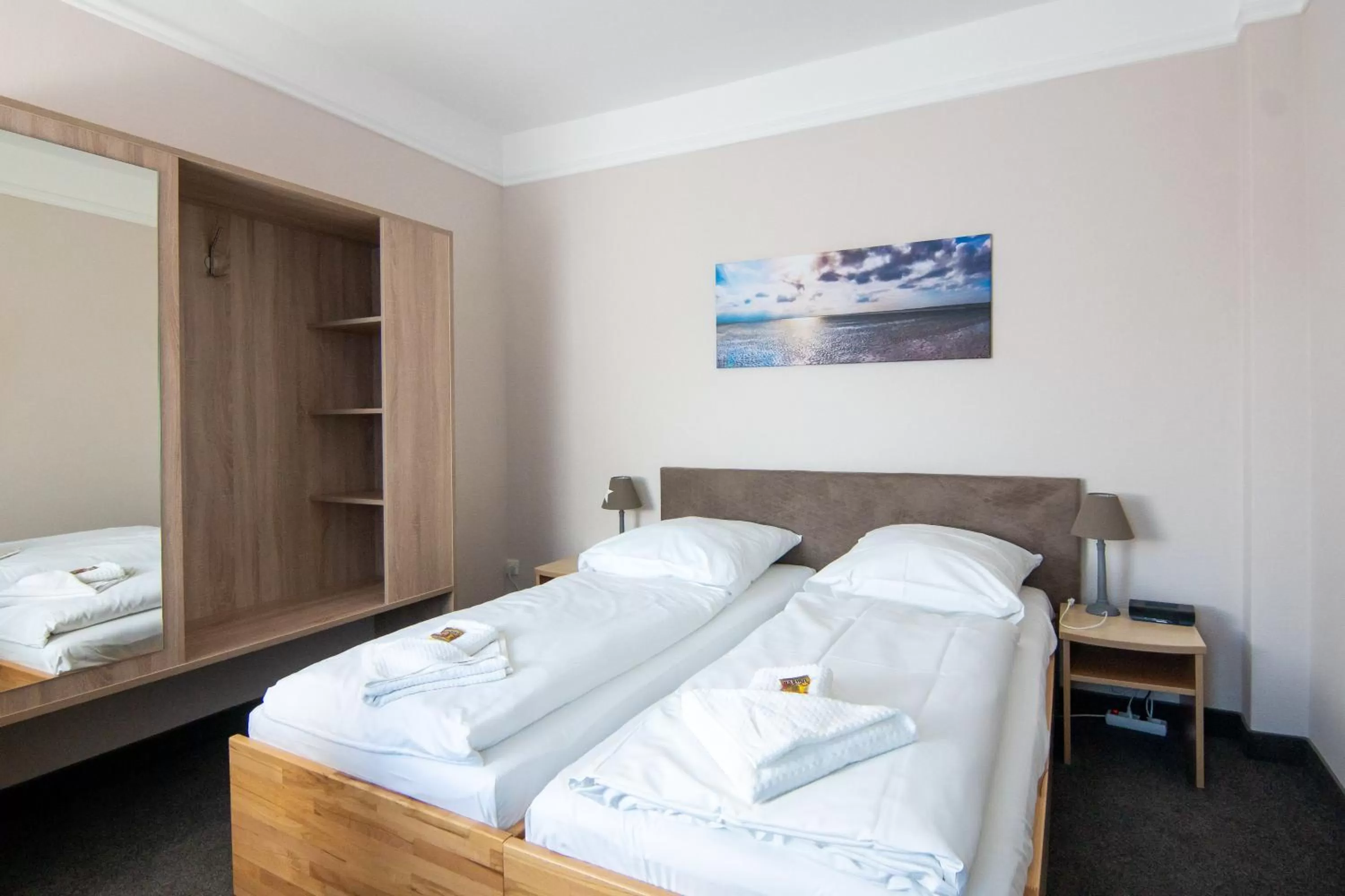 Photo of the whole room, Bed in Nordsee-Hotel Hinrichsen