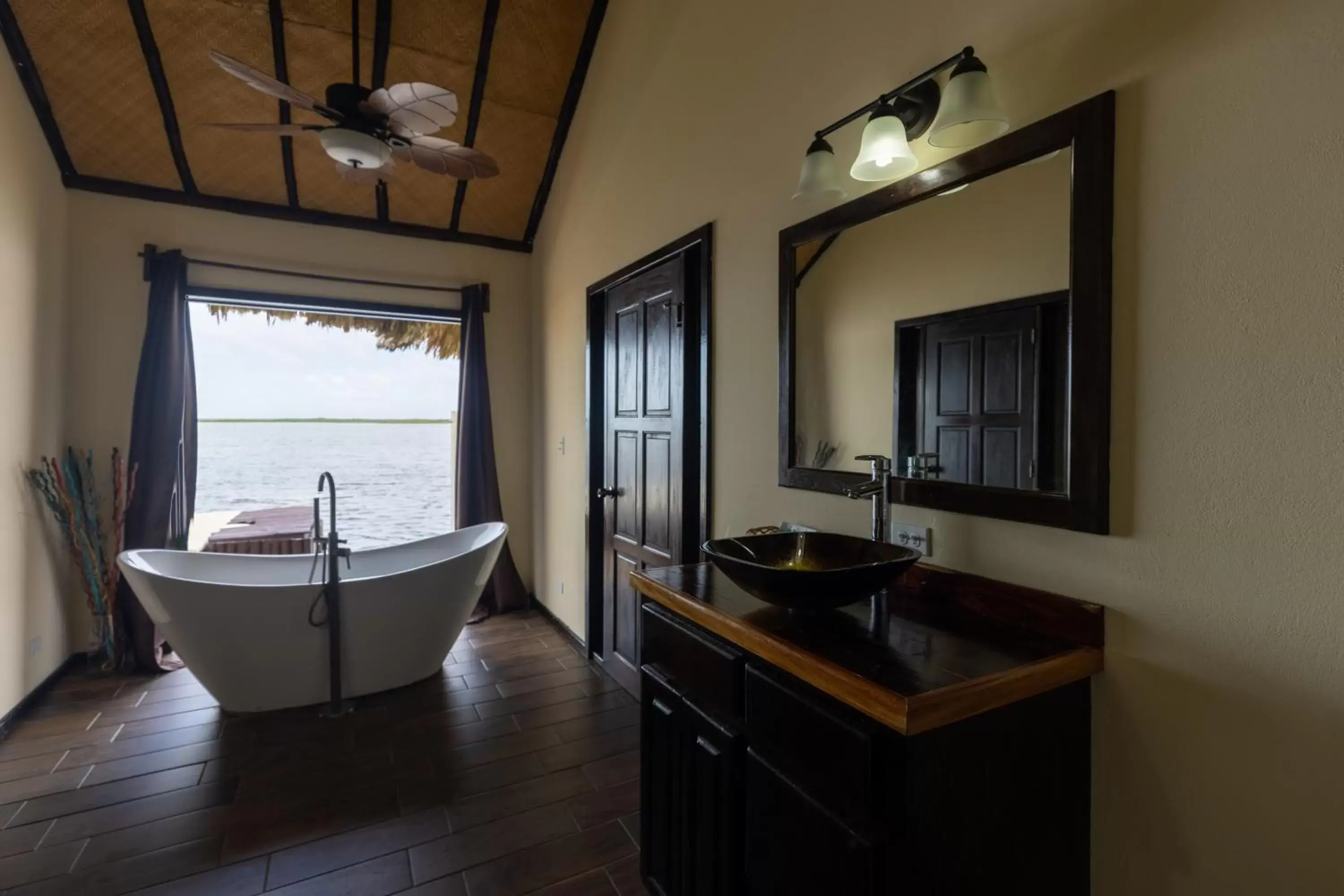 Bathroom in Lina Point Belize Overwater Resort