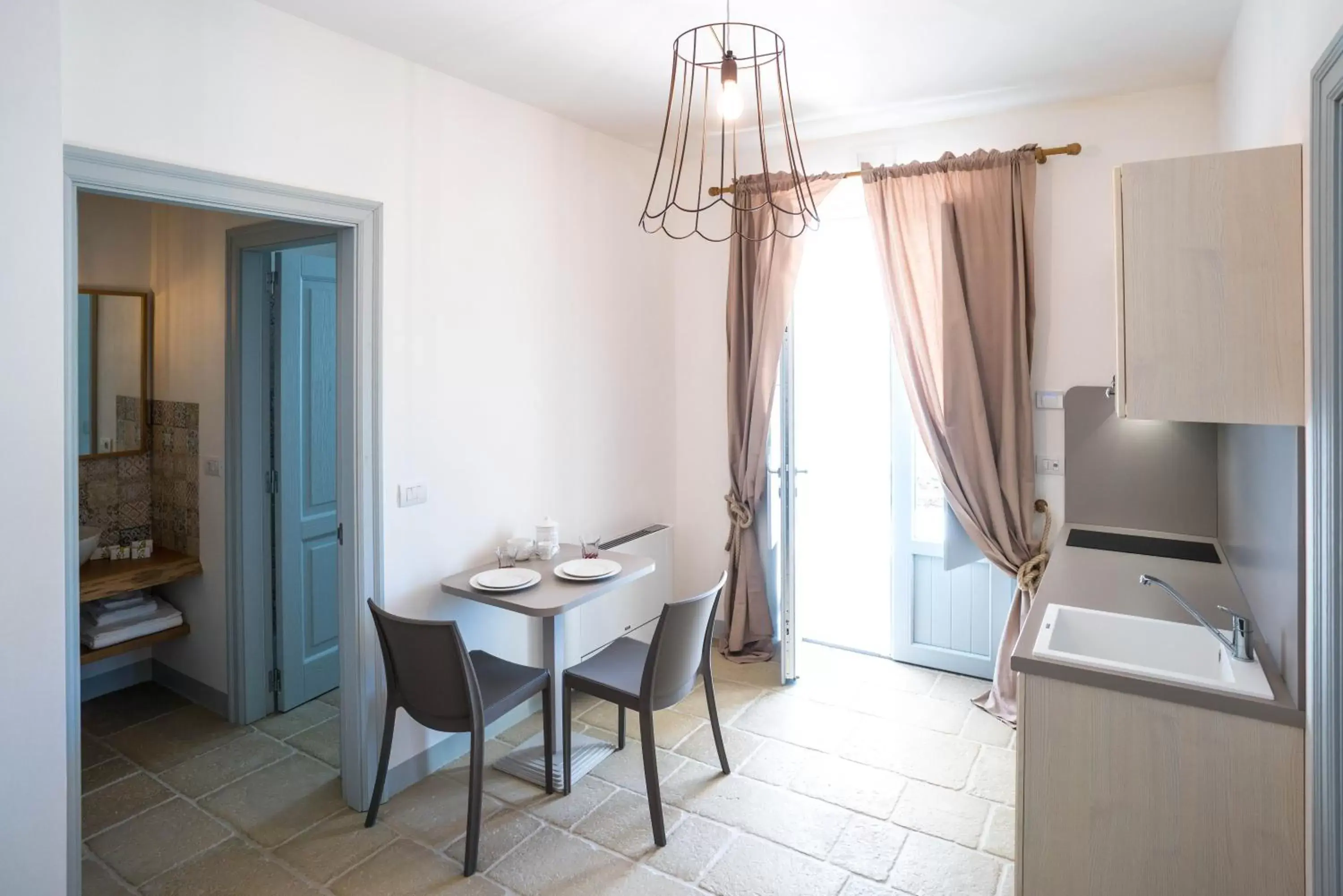 Kitchen or kitchenette, TV/Entertainment Center in Borgo Cozzana