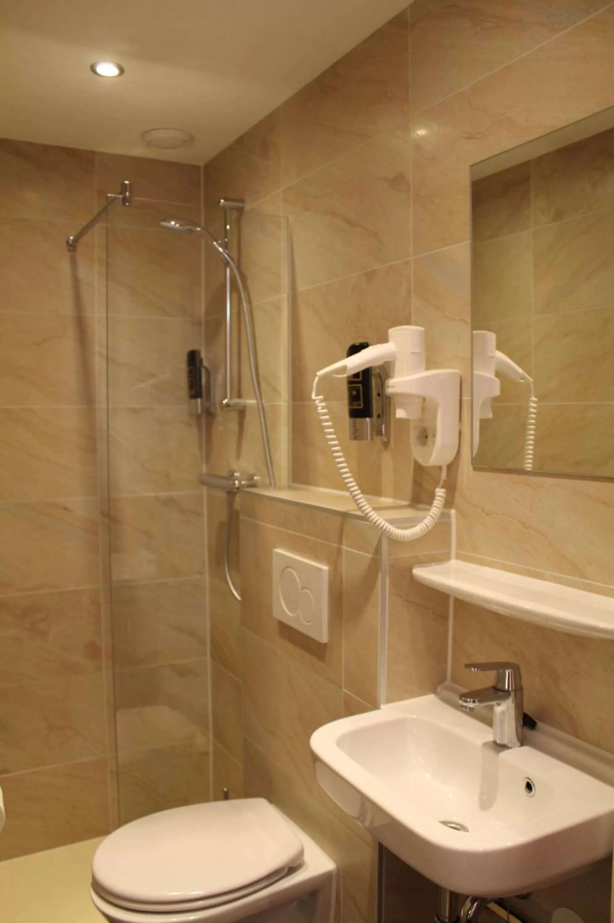 Bathroom in Blossoms City Hotel