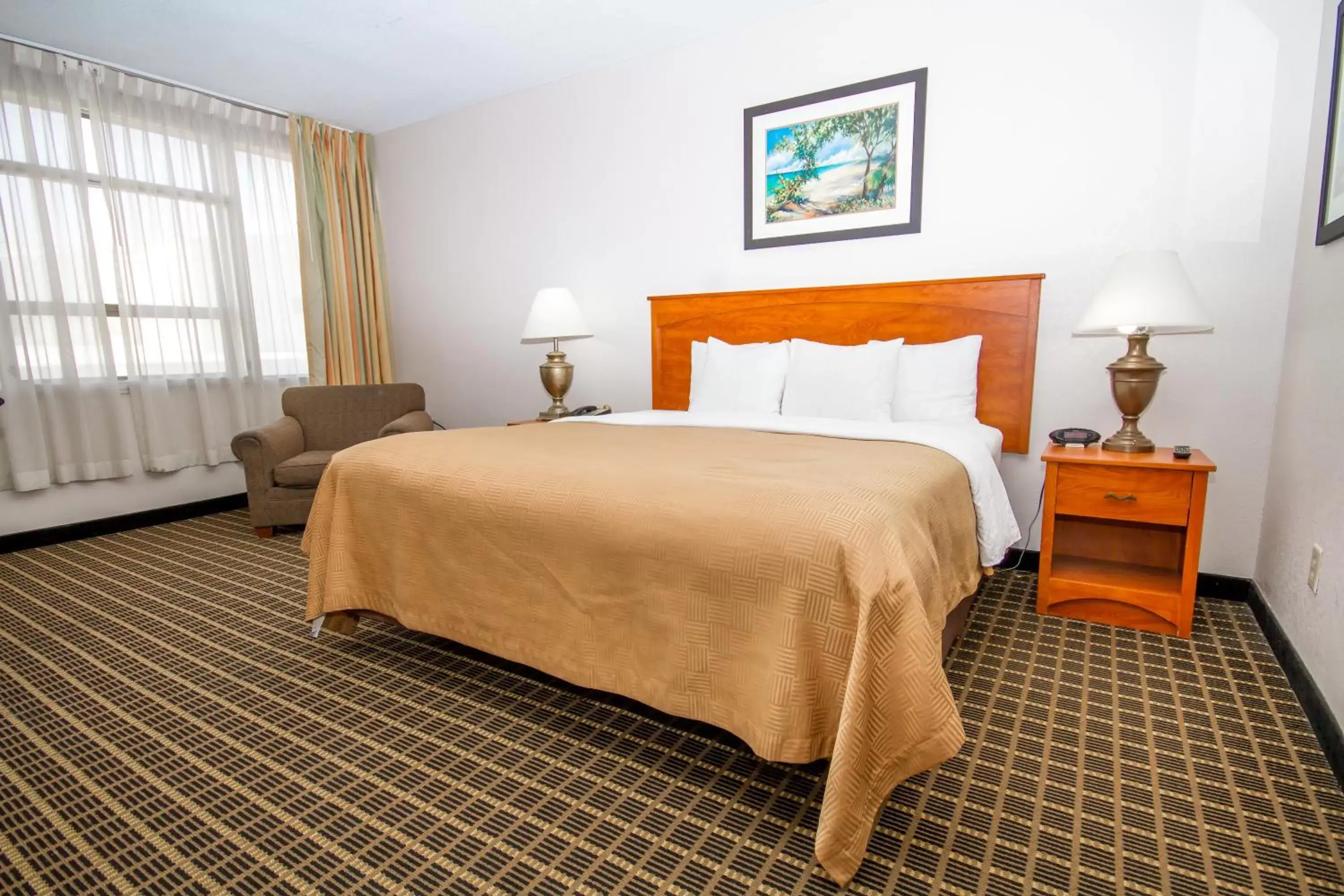 Bed in Clarion Inn & Suites Miami International Airport