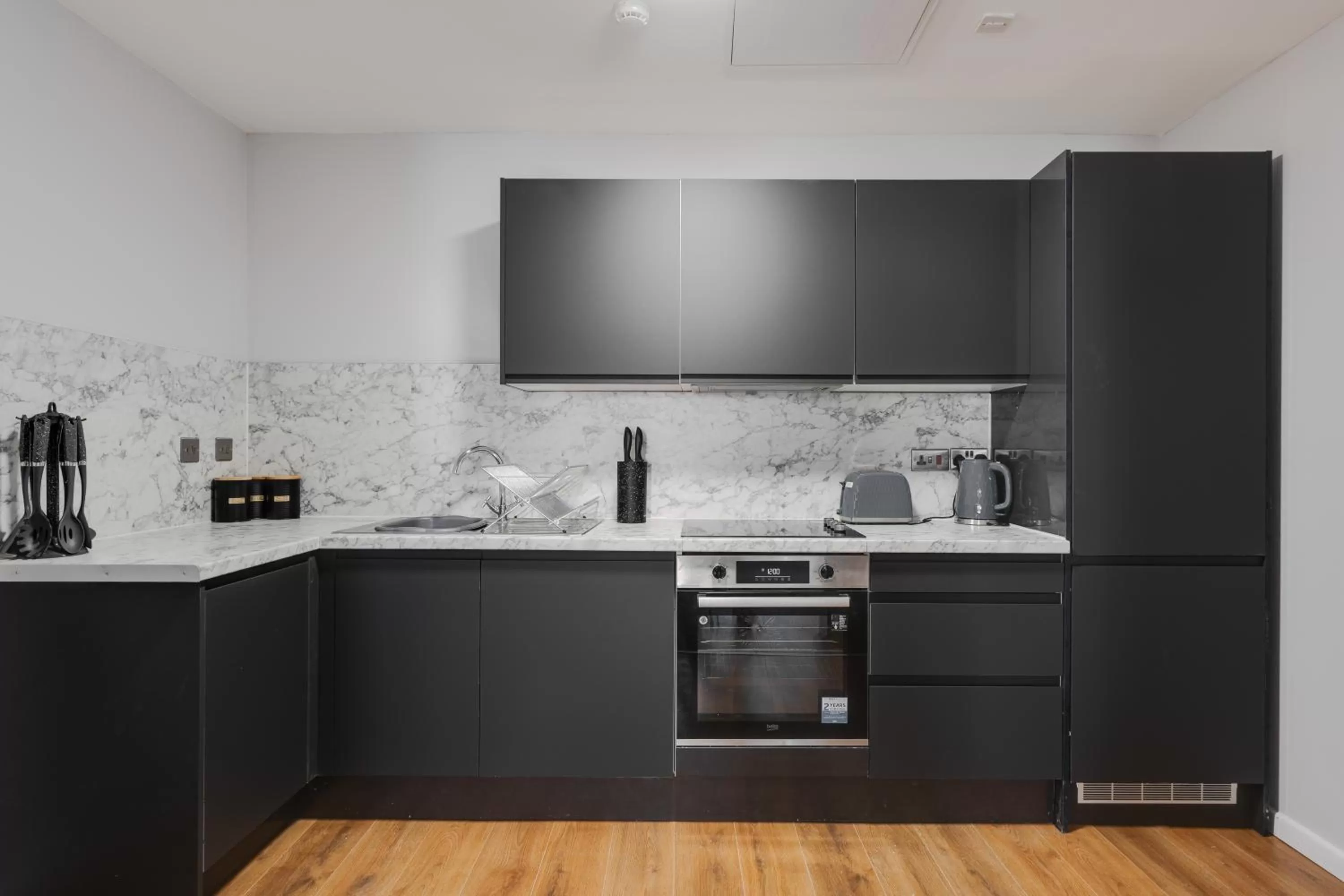 Kitchen or kitchenette in Stanley St Suites By GuestFirst