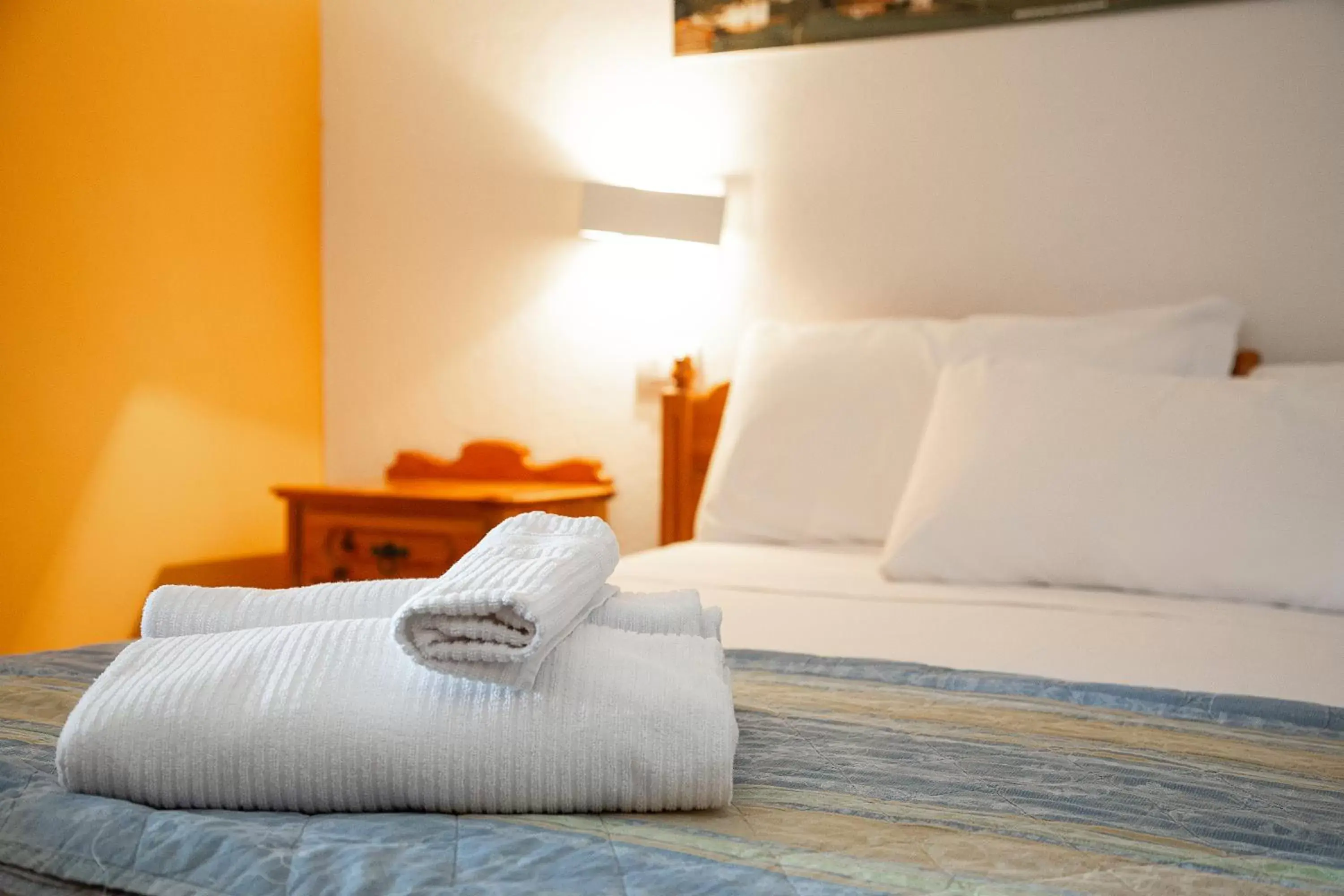 Bed in Hotel Villaggio Nevada