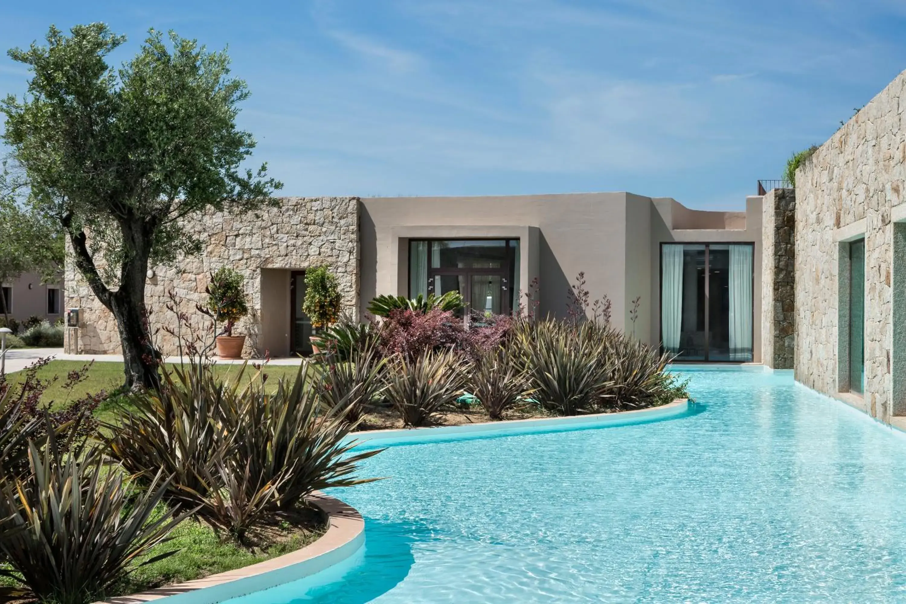 Property building, Swimming Pool in Baglioni Resort Sardinia - The Leading Hotels of the World