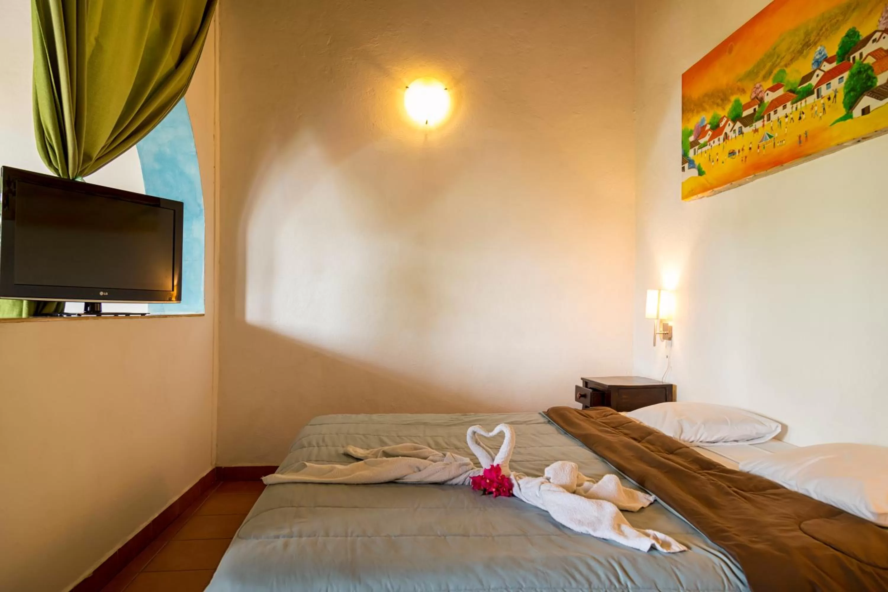 Bed in Hotel La Posada del Sol