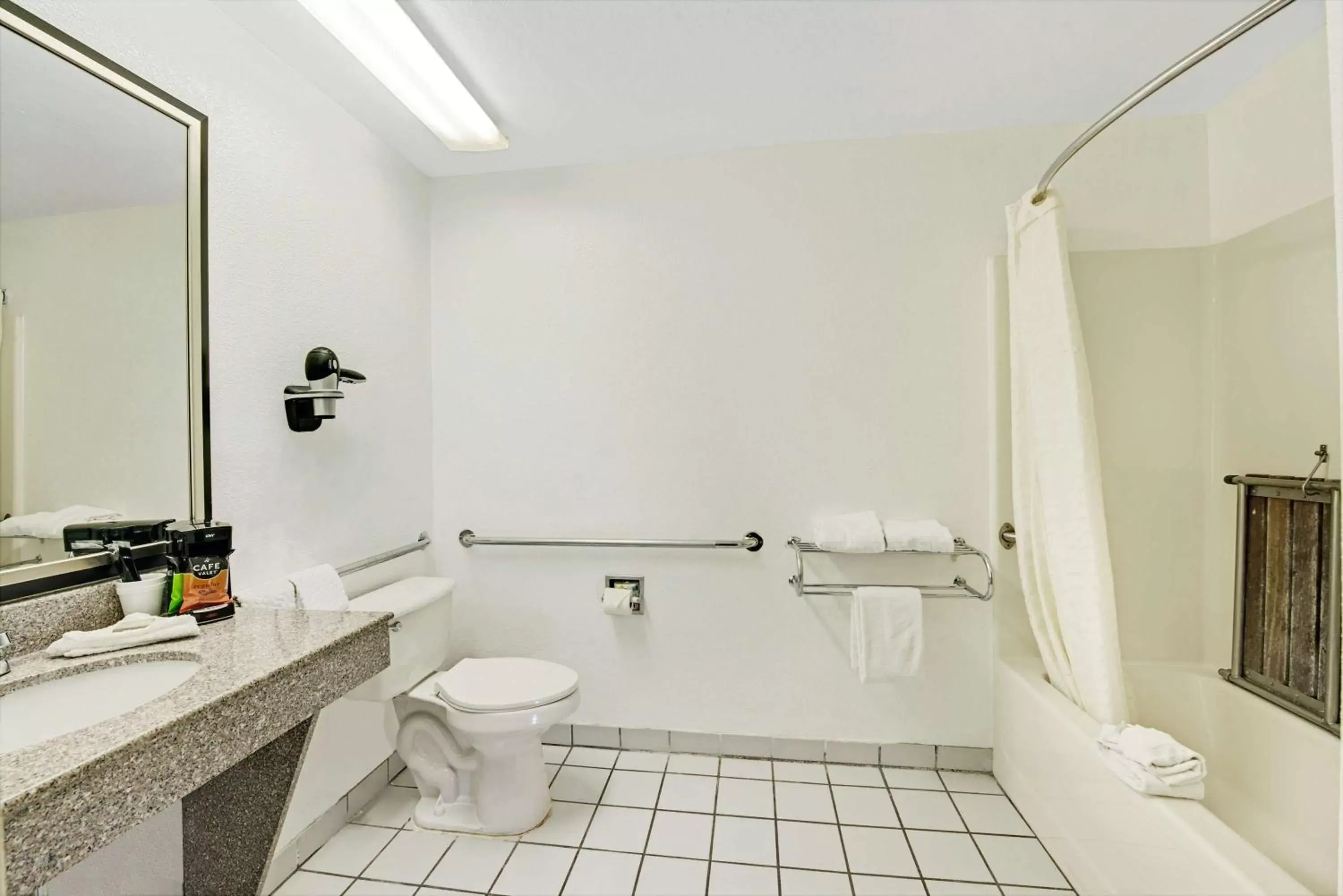 Bathroom in SureStay Plus Hotel By Best Western San Antonio North 281 N