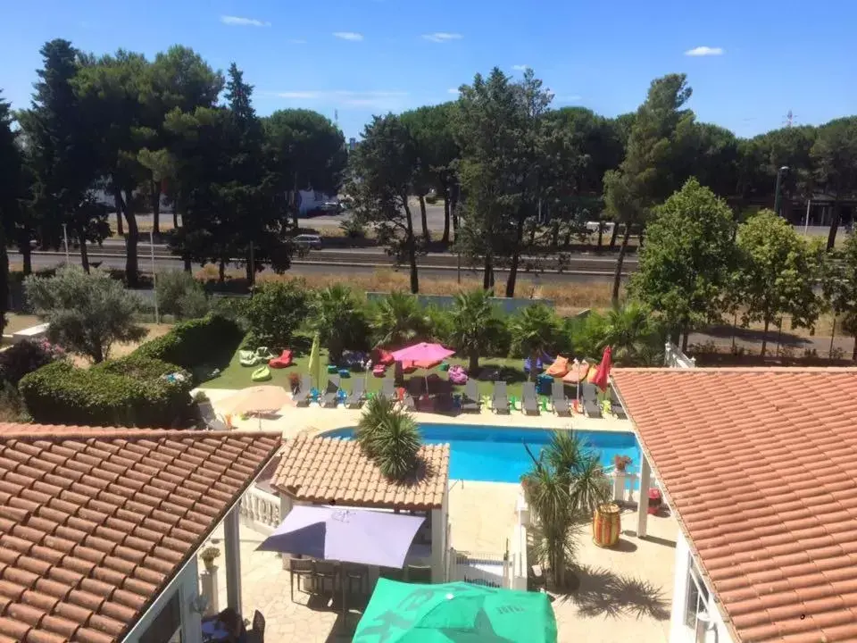 Day, Pool View in Hotel & Restaurant Le Mejean - Parc des Expositions