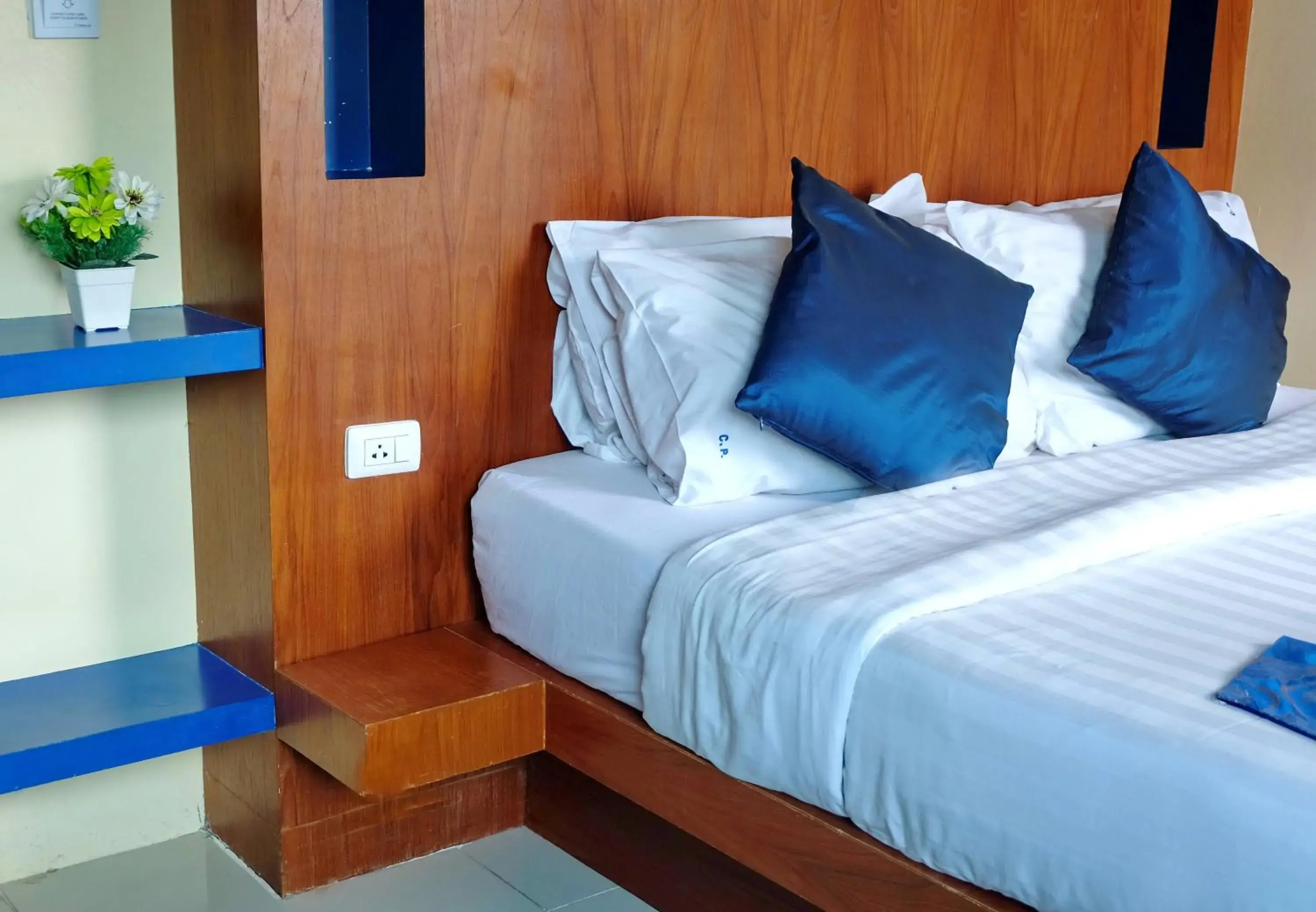 Bed in Calypso Patong Hotel