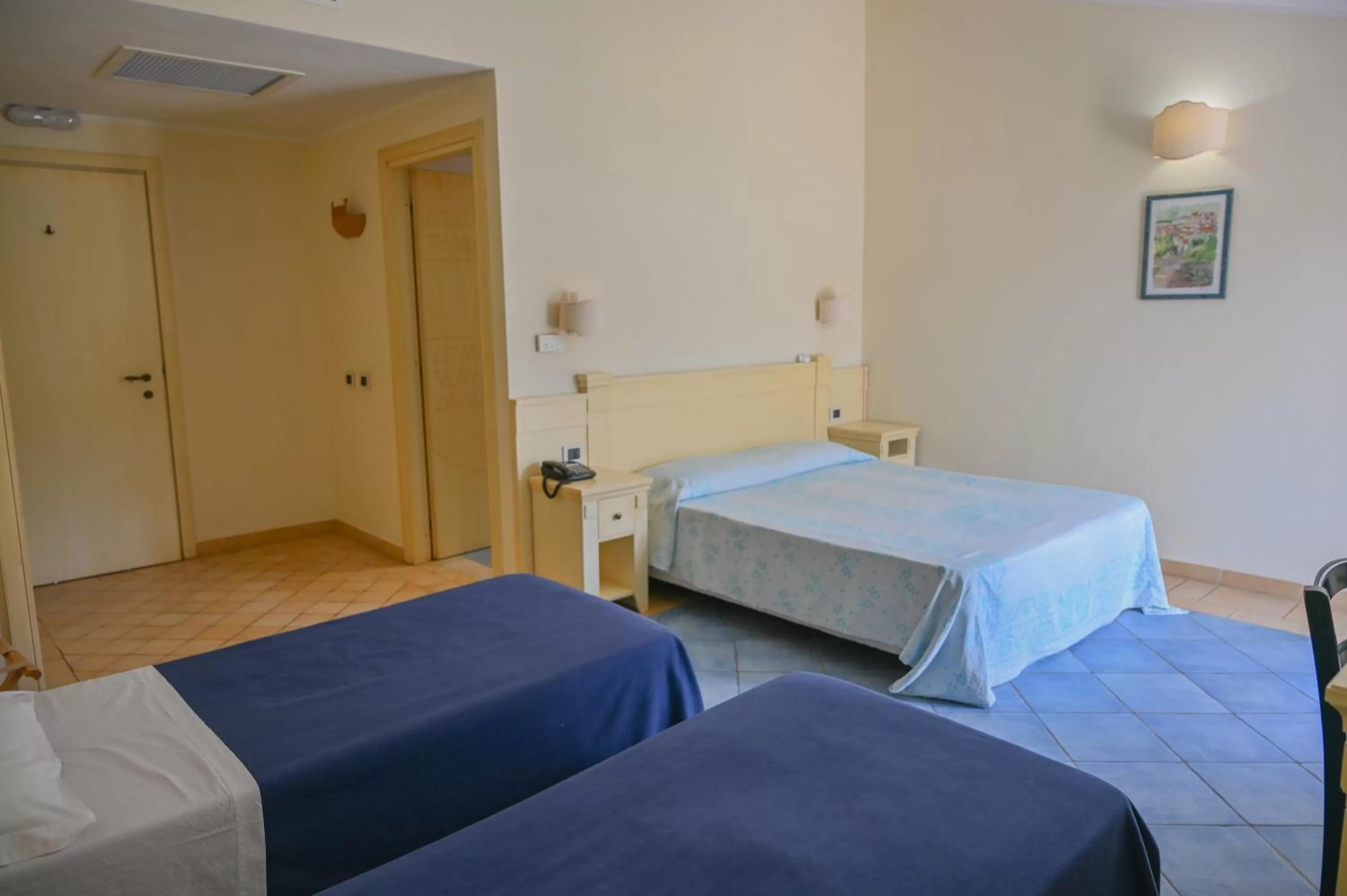 Bed in Hotel Baja Romantica