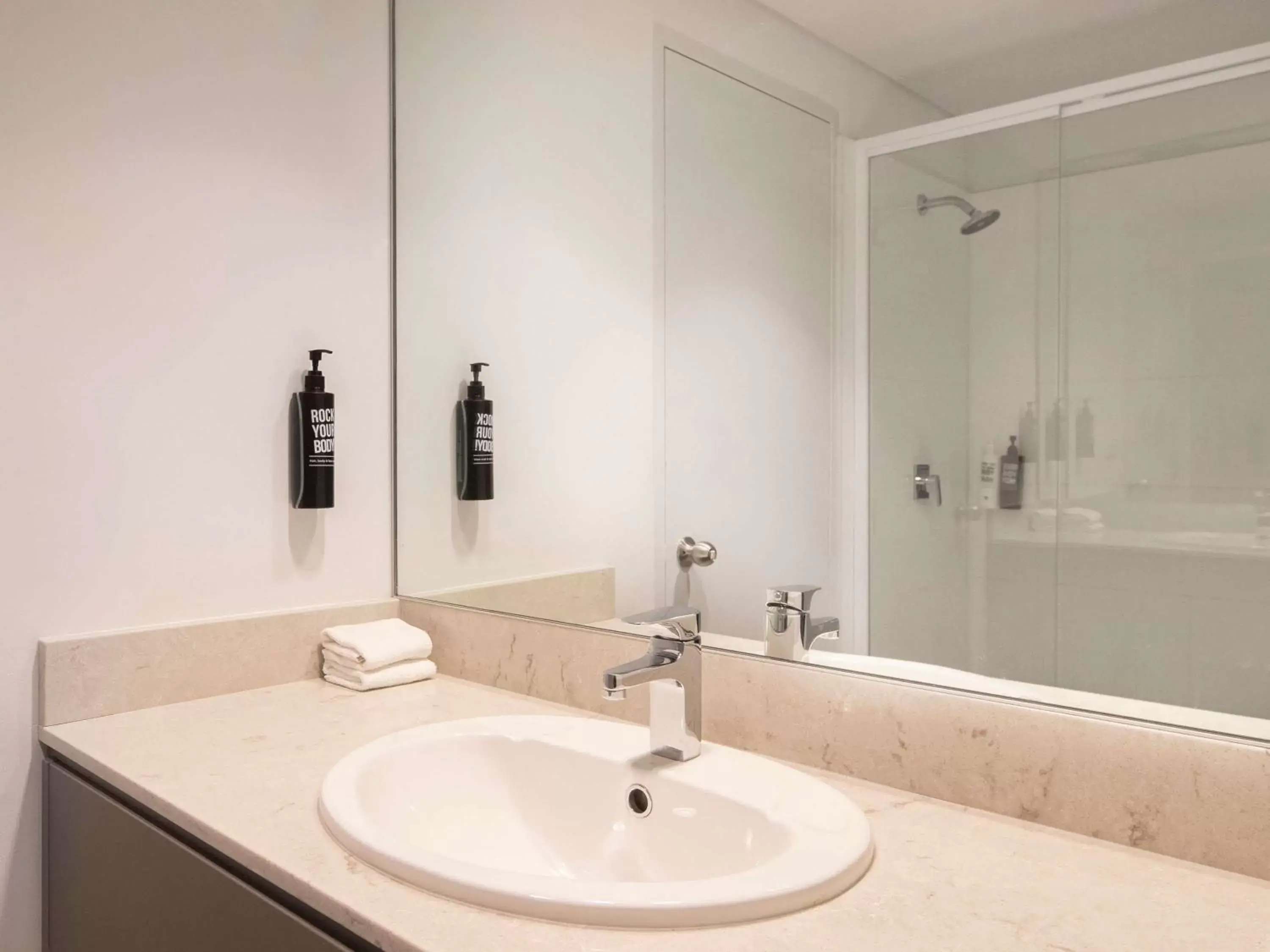 Bathroom in ibis Styles Sydney Central
