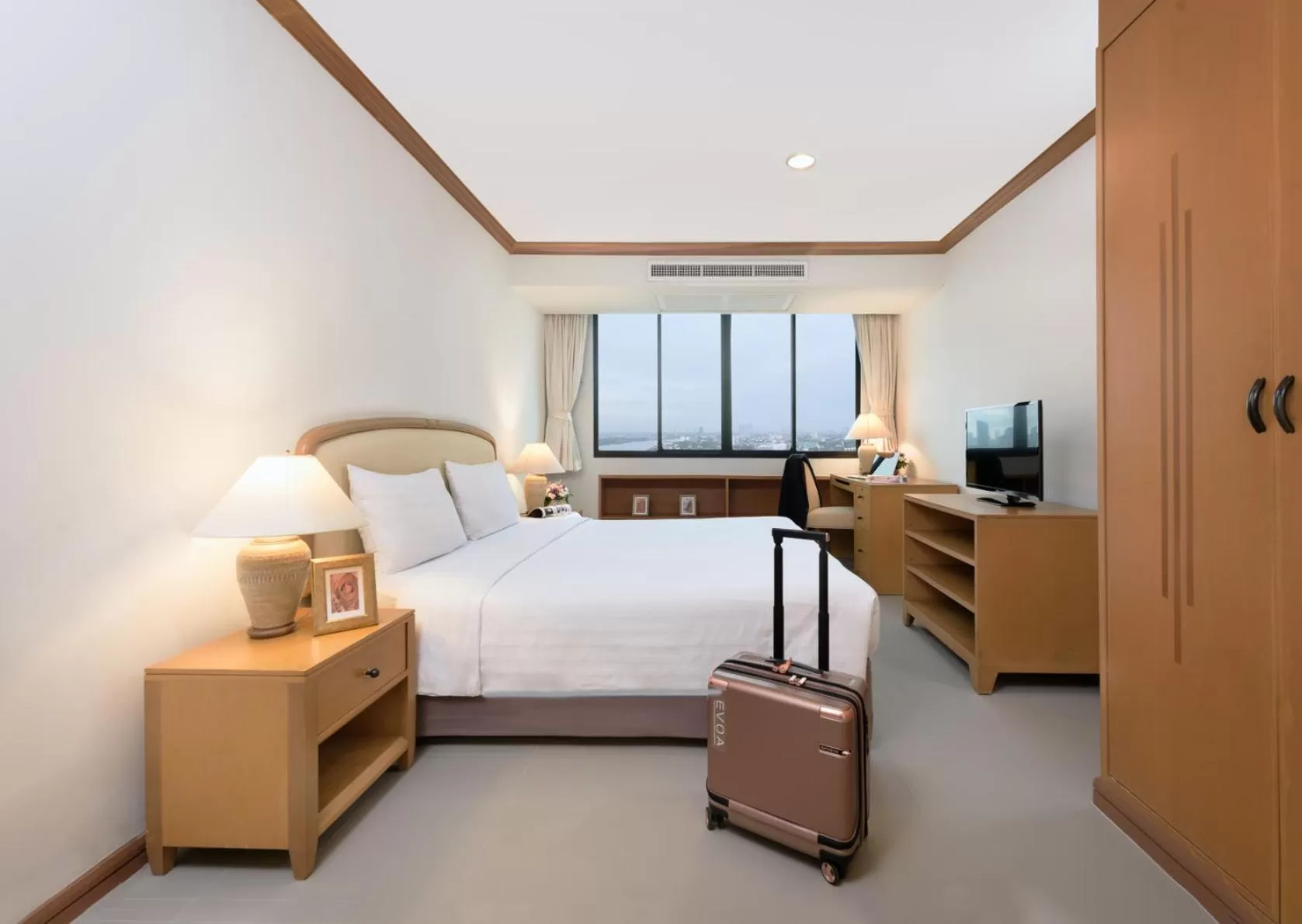 Bed in Riverine Place Hotel and Residence