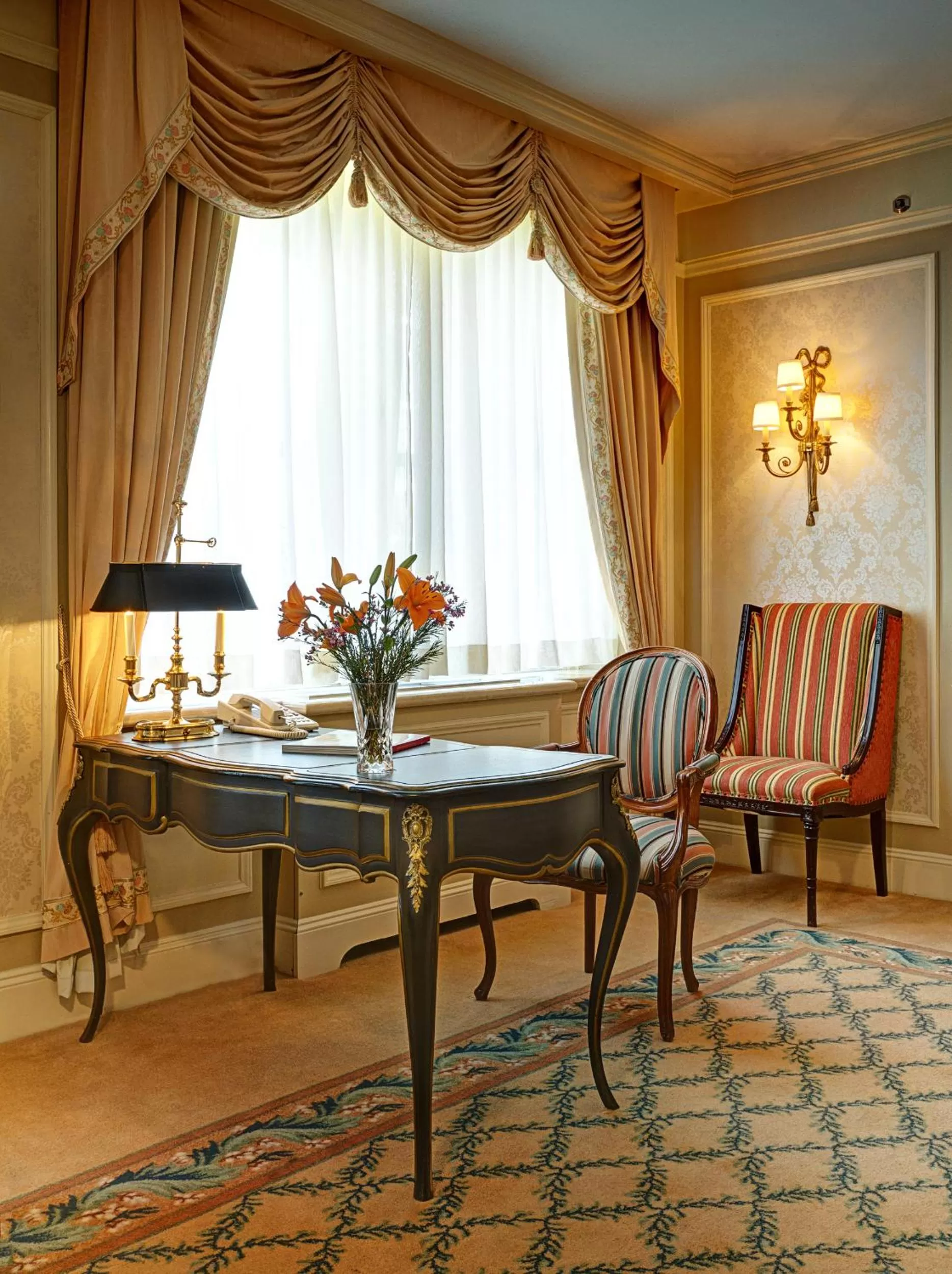 Living room in Hotel Elysee by Library Hotel Collection