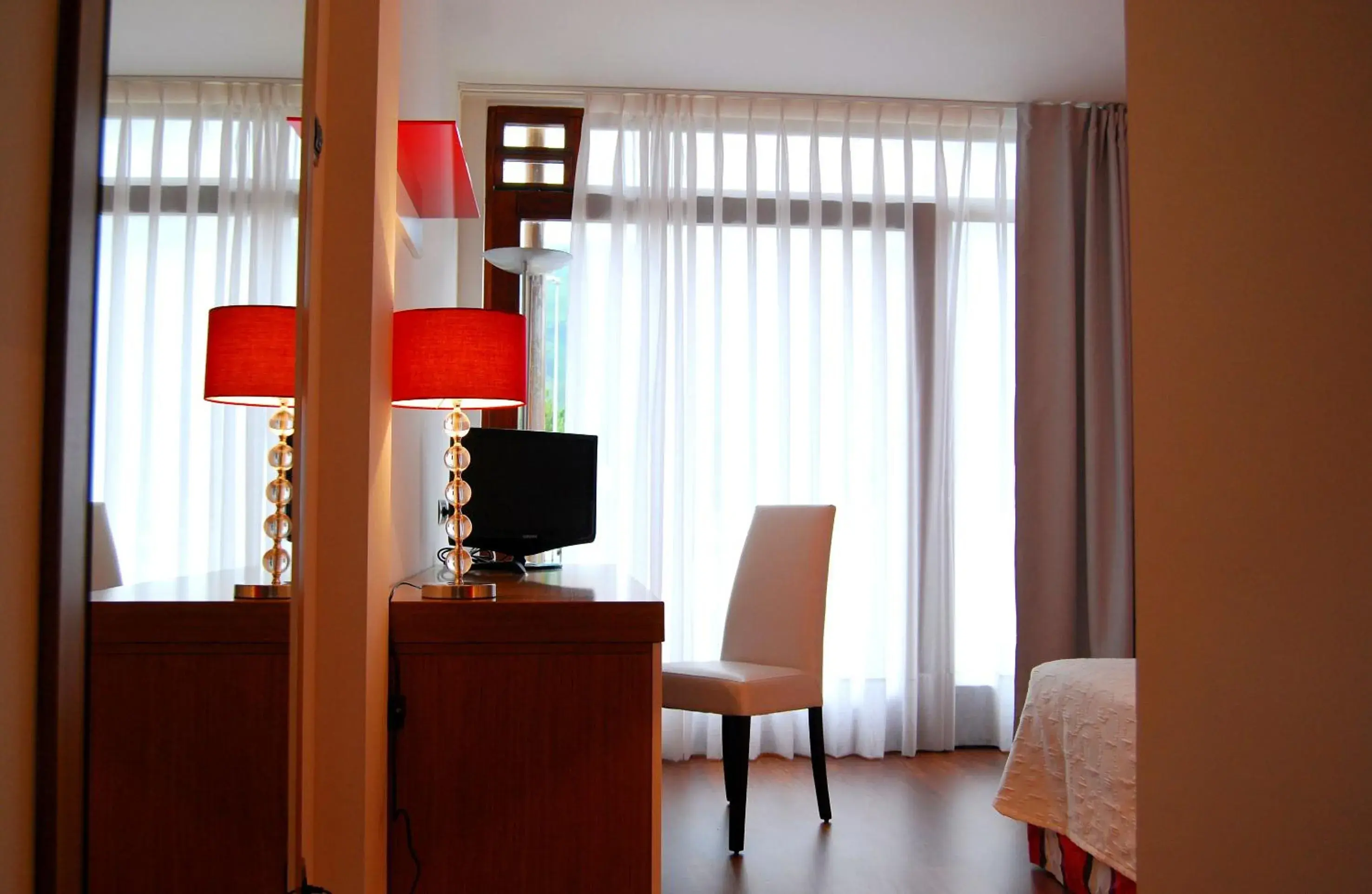 Day, TV/Entertainment Center in Hotel Indiana Llanes