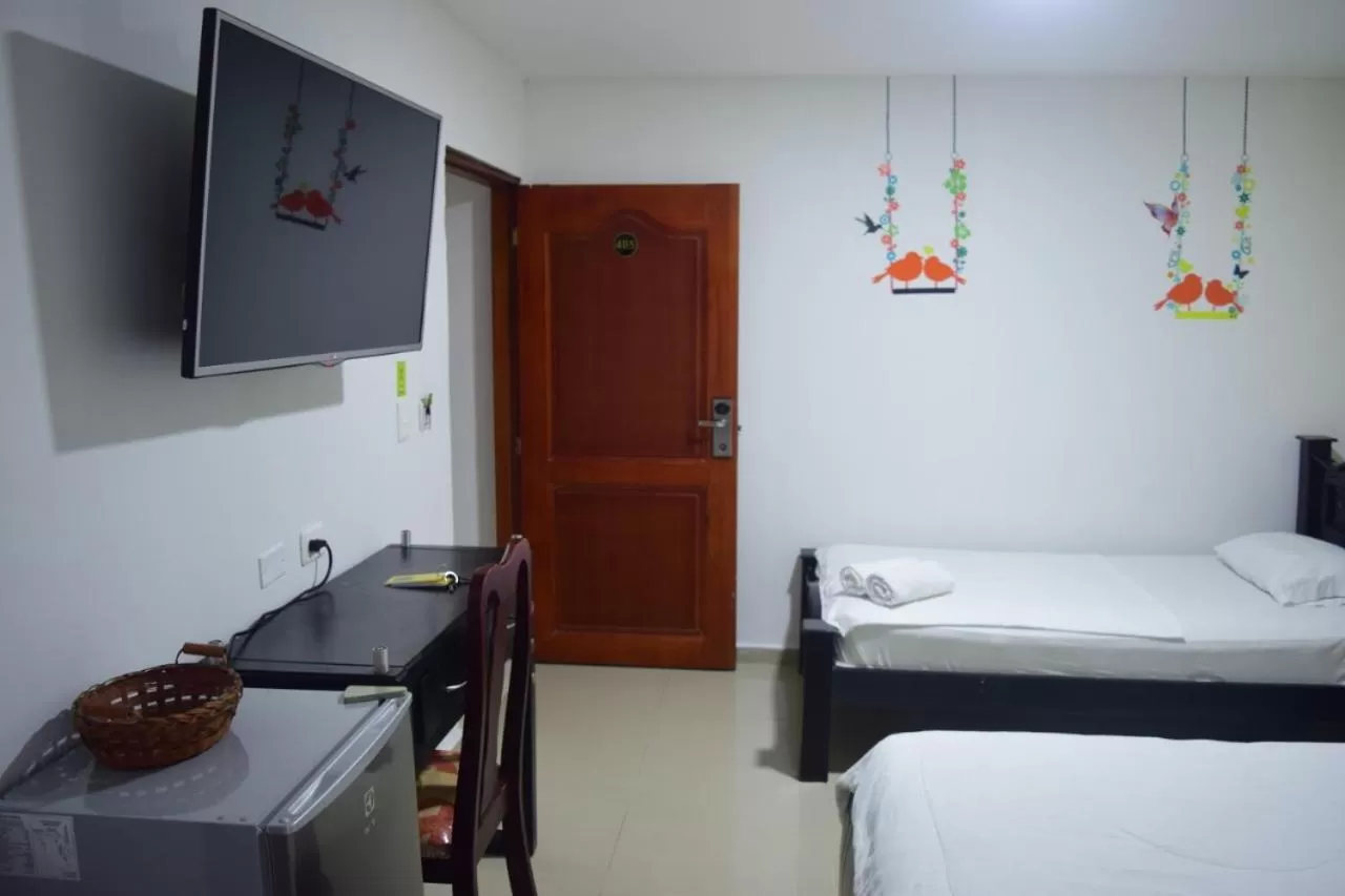 Bed in Hotel Intersuites