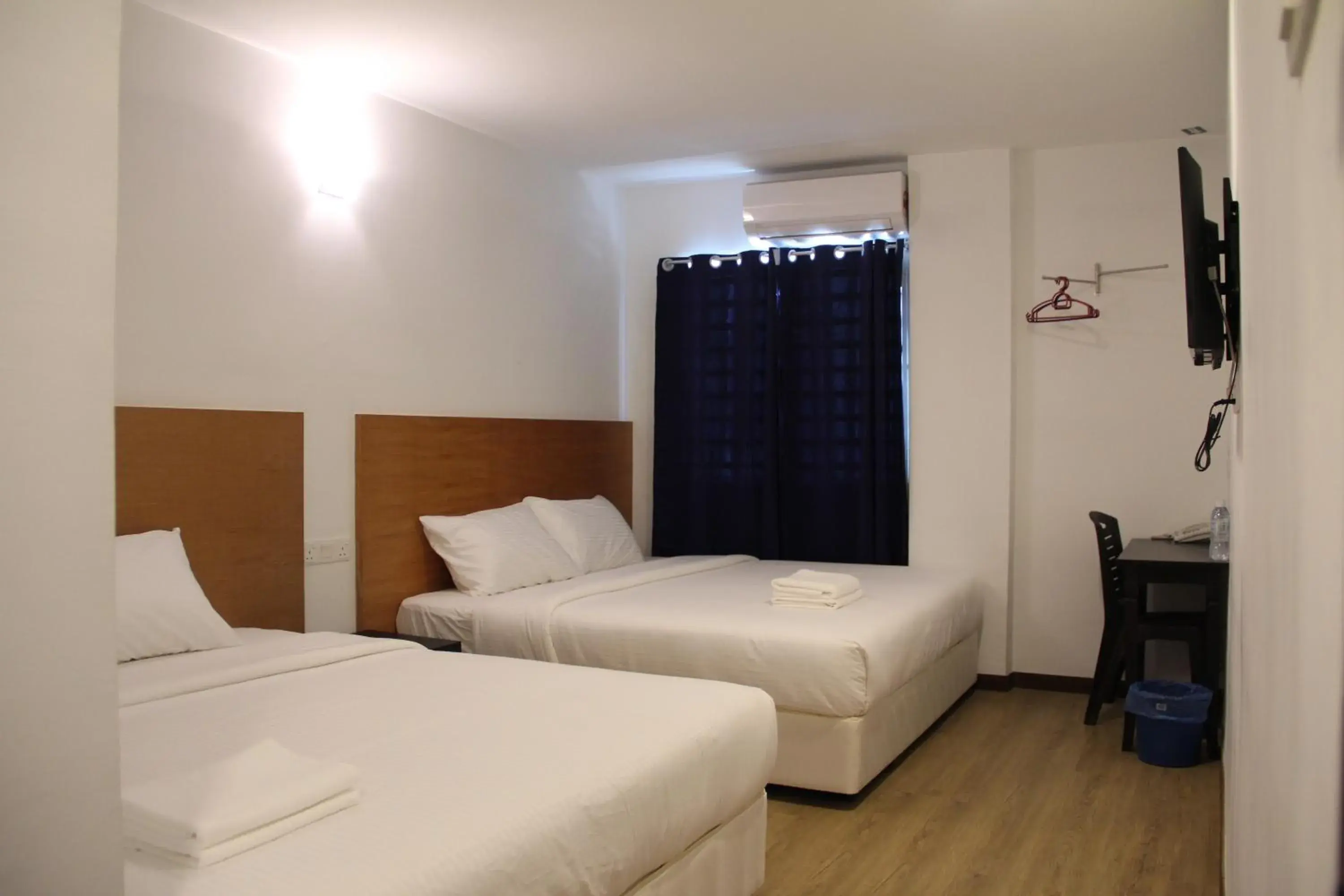 Bed in Amanjaya Hotel