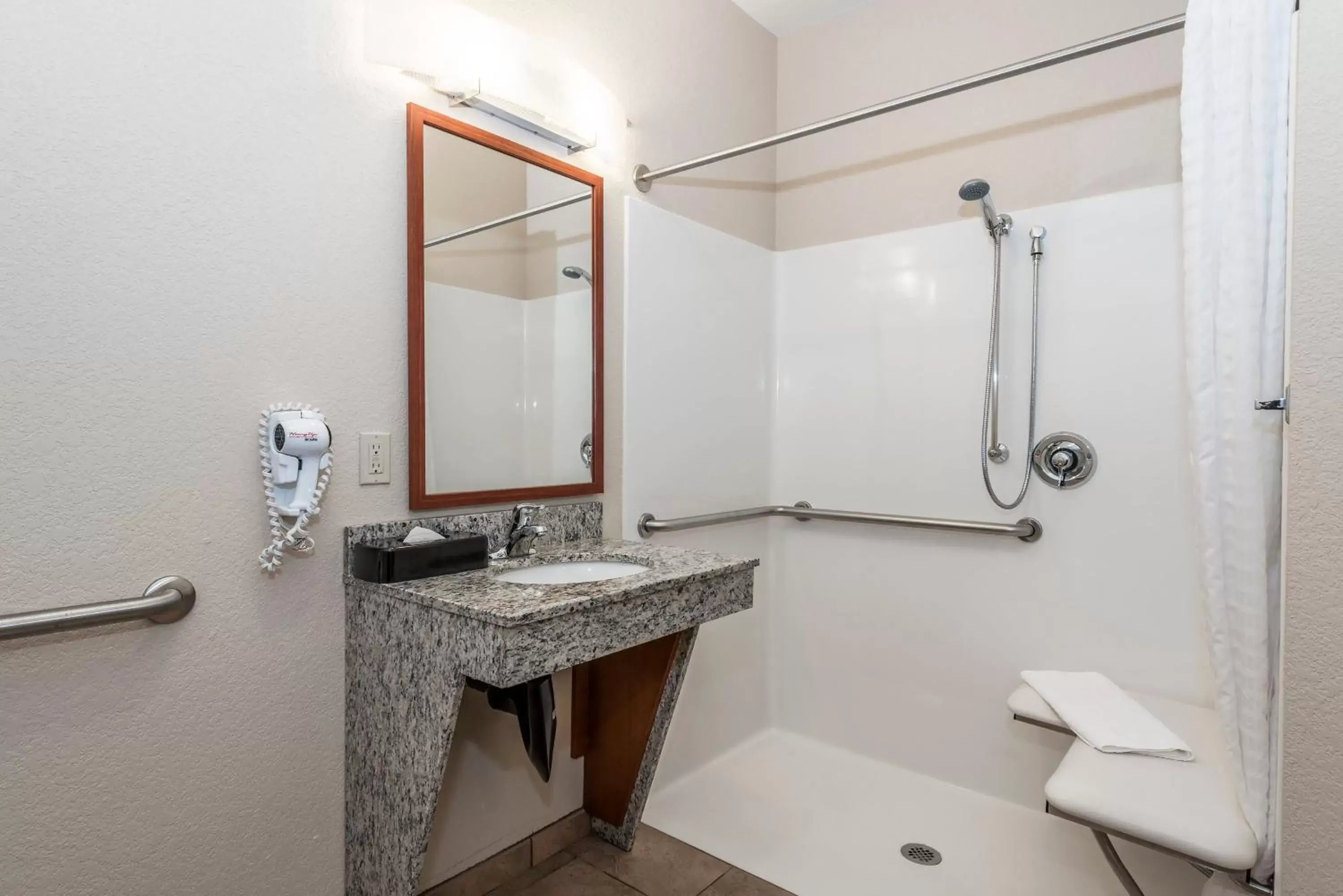 Photo of the whole room, Bathroom in Candlewood Suites Burlington, an IHG Hotel