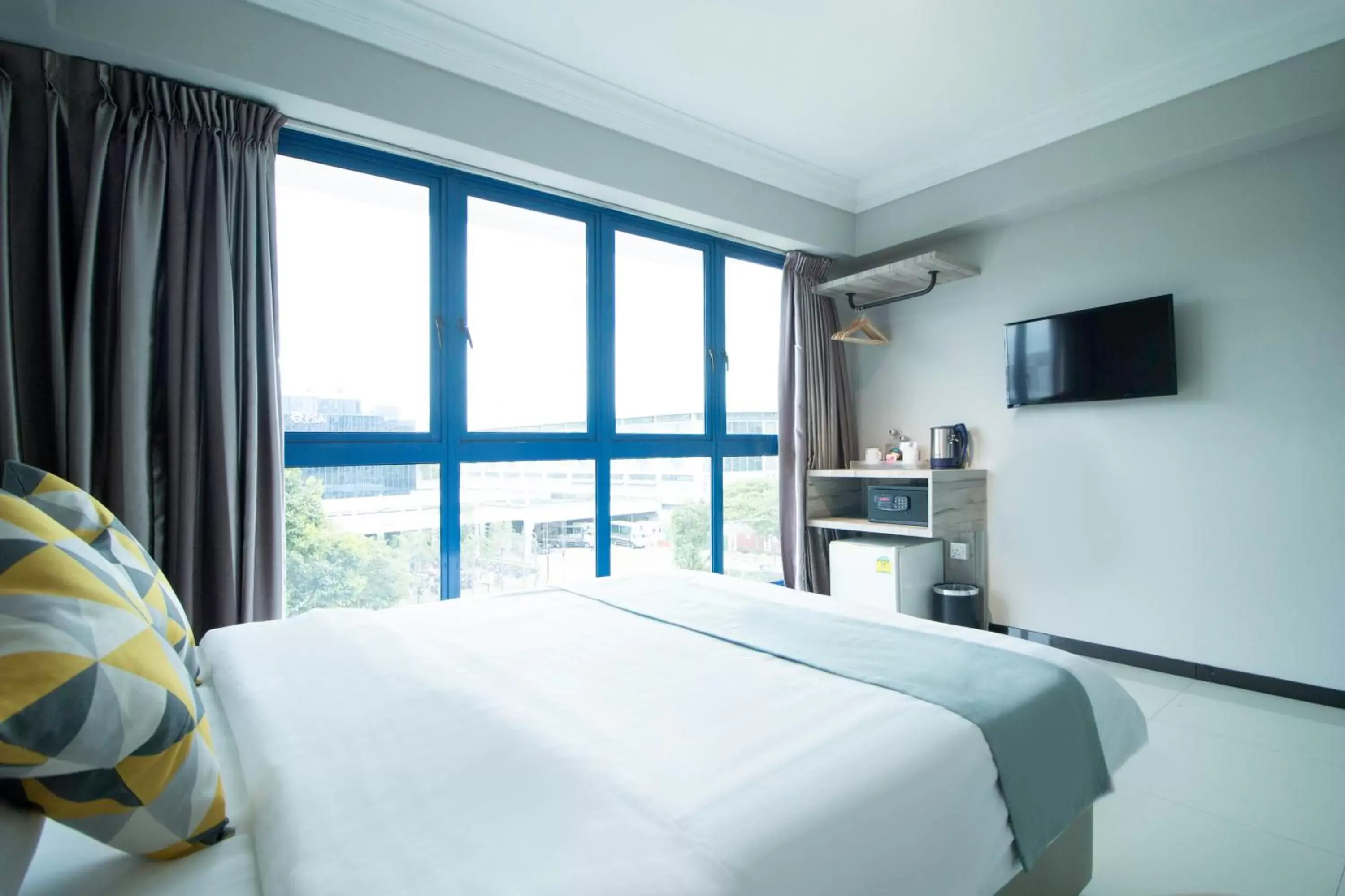 Bedroom in Harbour Ville Hotel
