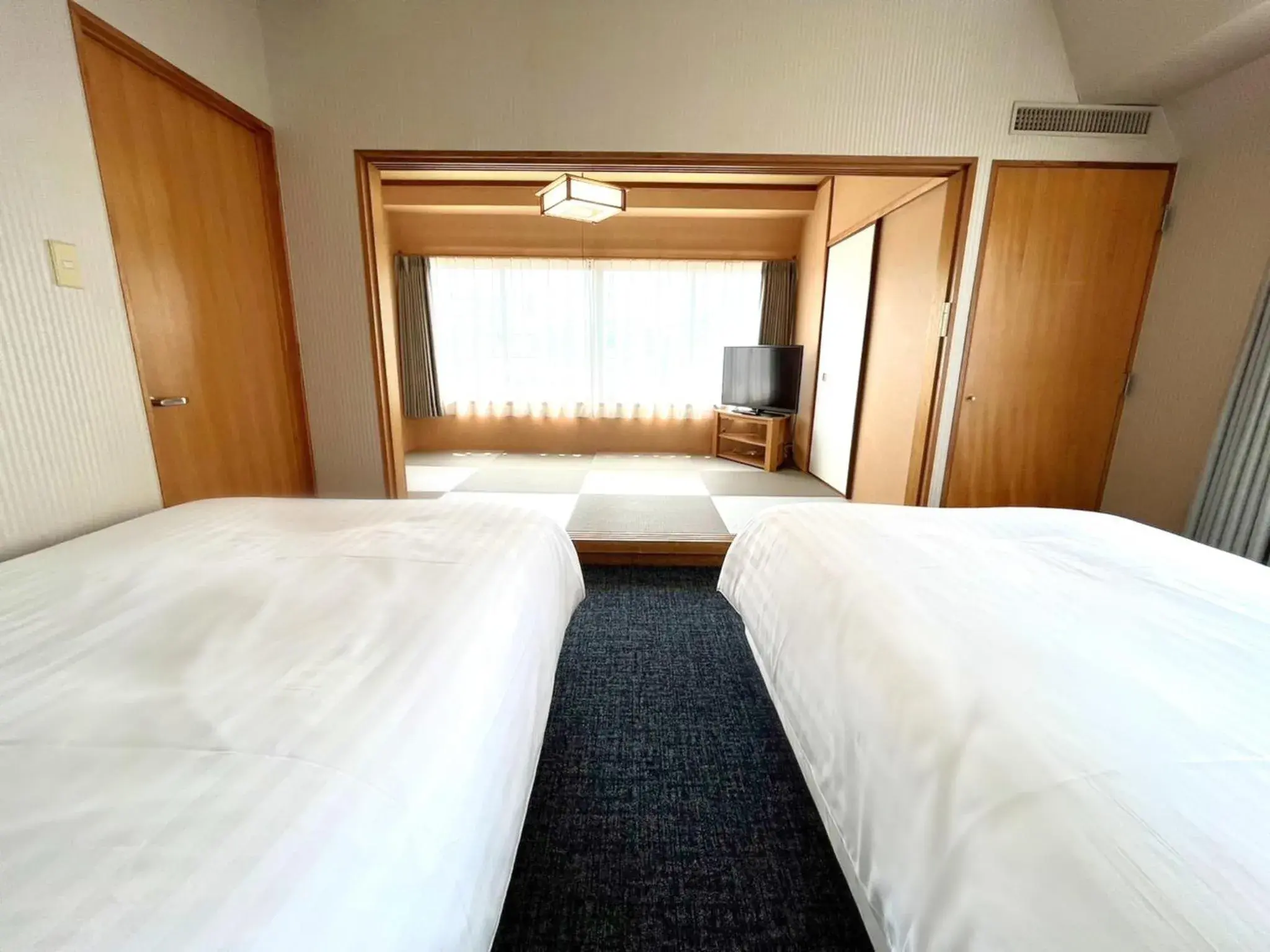 Bed in Court Hotel Fukuoka Tenjin