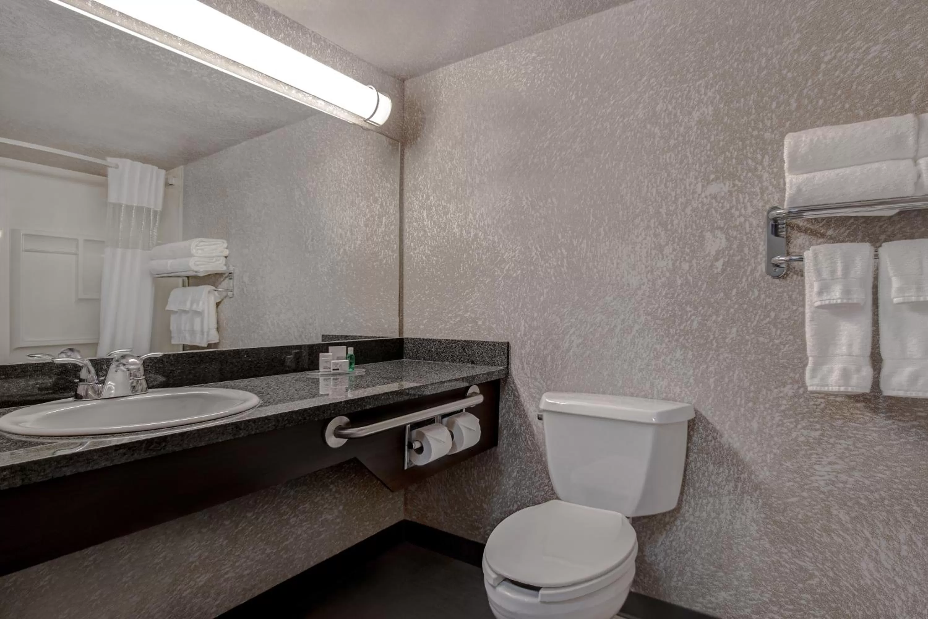 Toilet in Days Inn by Wyndham Medicine Hat