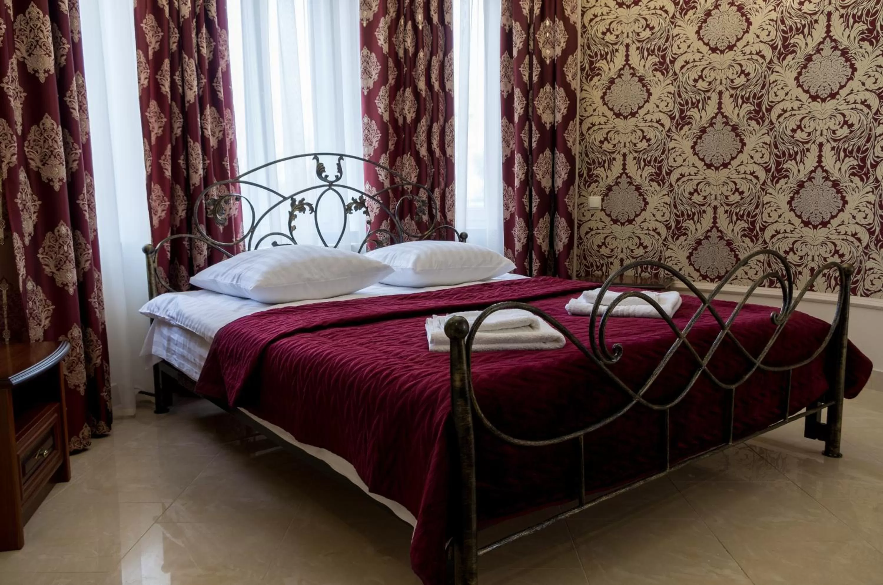 Bed in Ermitazh Hotel Complex