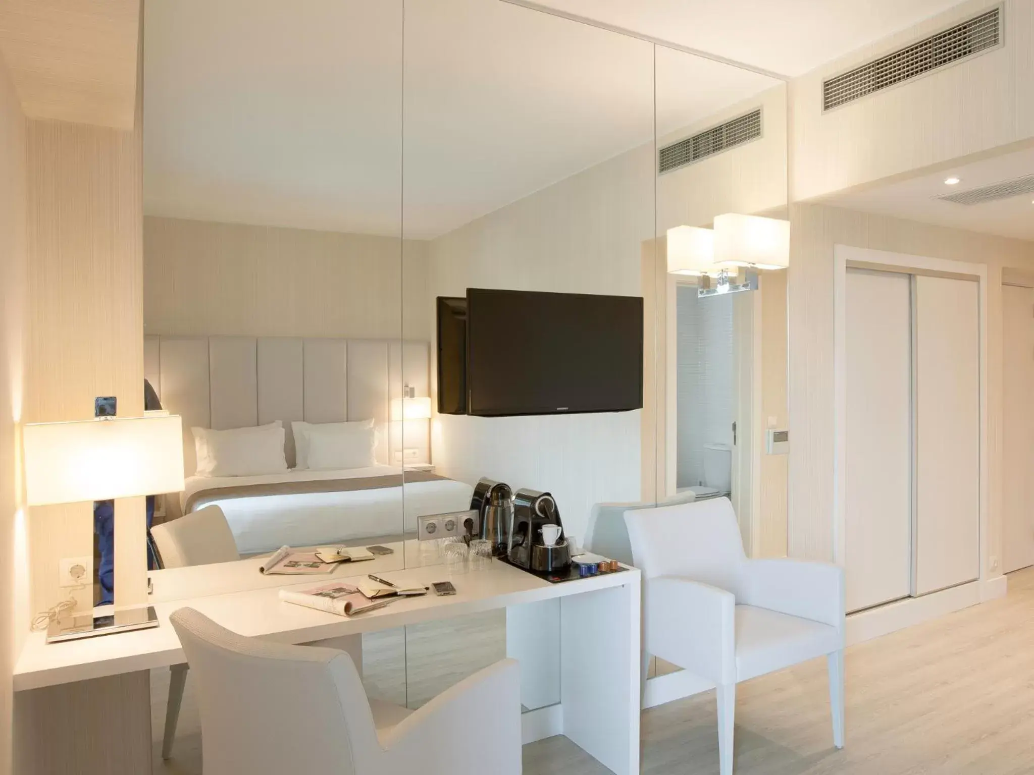 Bedroom, TV/Entertainment Center in Lutecia Smart Design Hotel