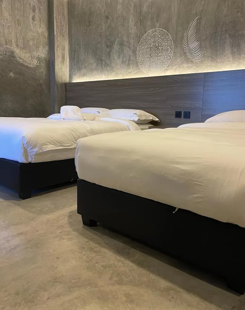 Bed in Sri Indar Hotel & Suites