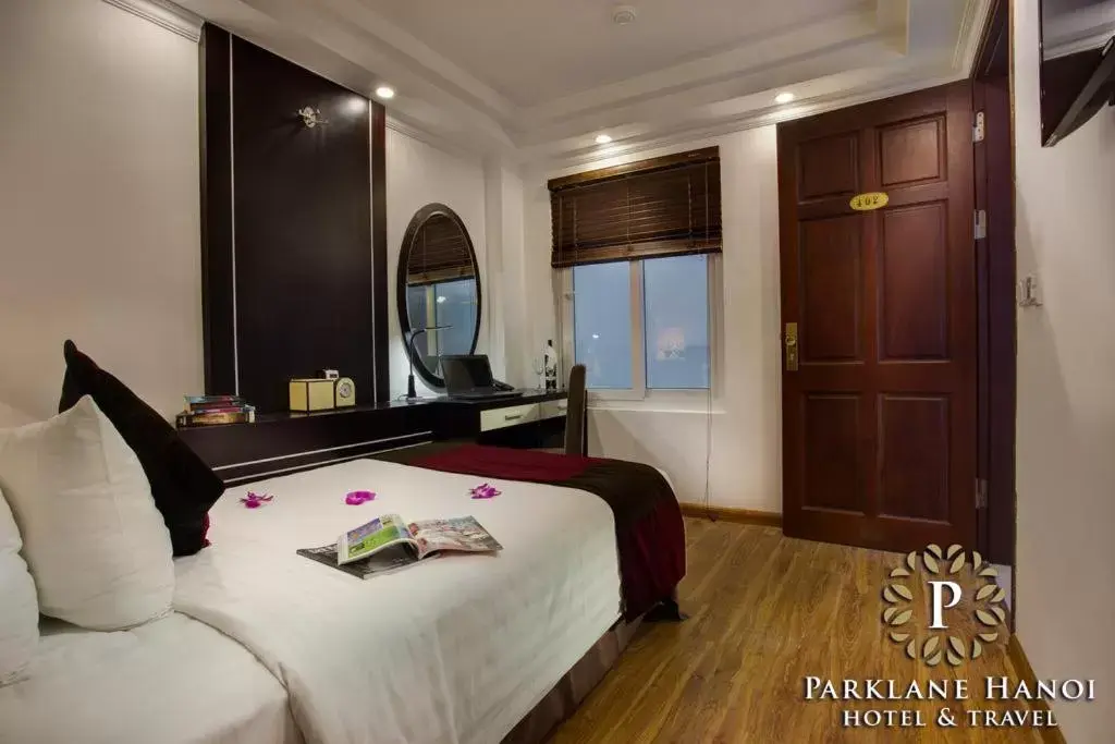Bed in Parklane Central Hanoi Hotel