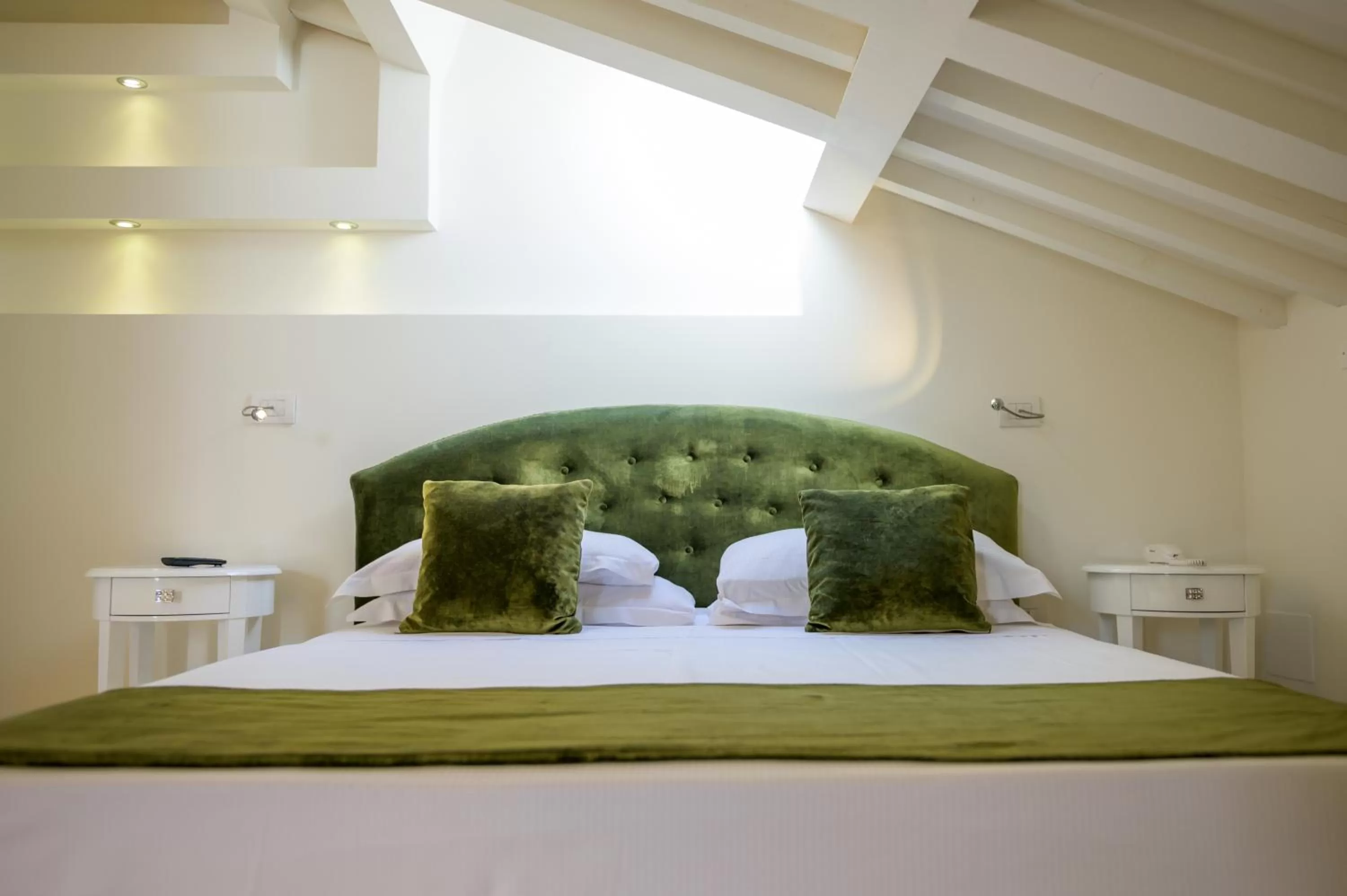 Bed in VILLA LIBERTY Boutique Hotel - Borgo Capitano Collection