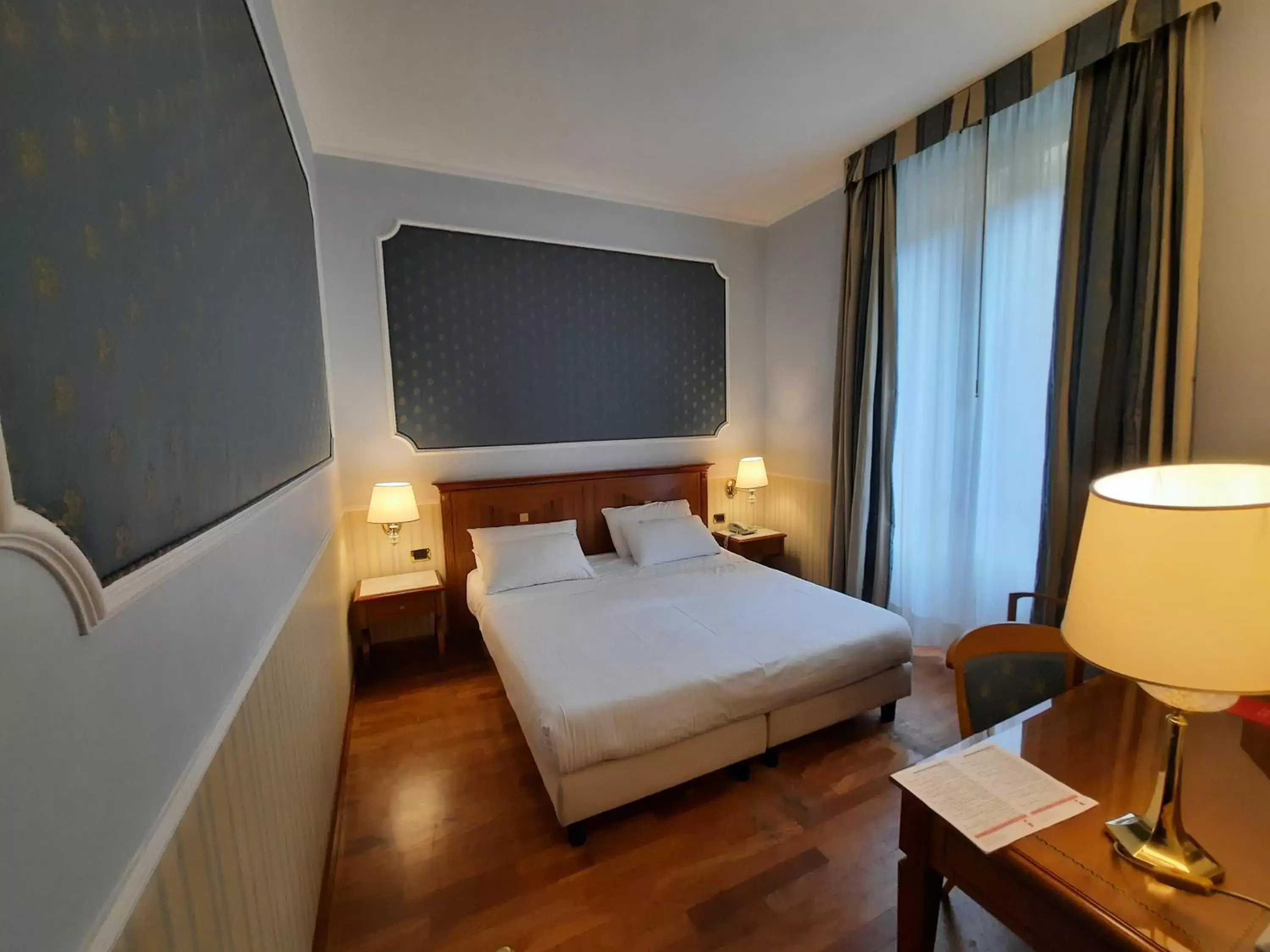 Bedroom, Bed in Andreola Central Hotel