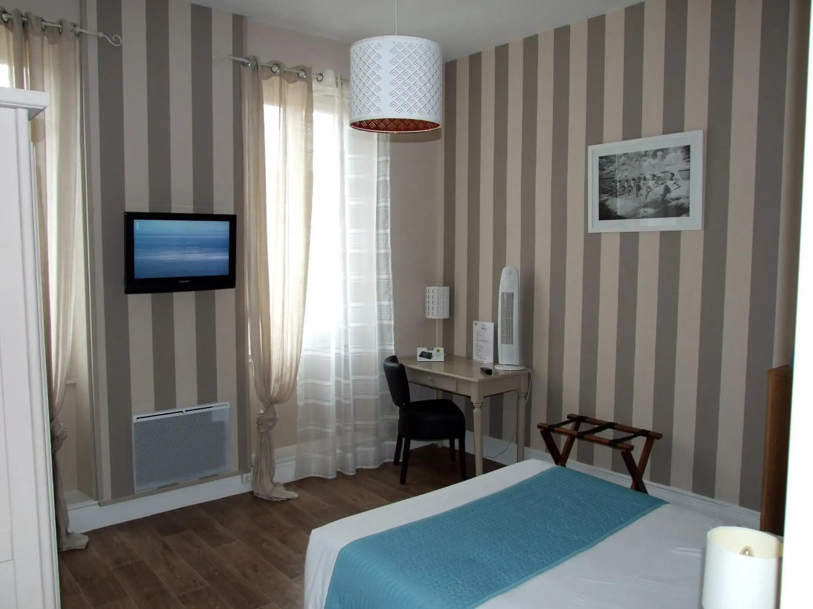 Photo of the whole room, Bed in Logis Hotel L'Occitan