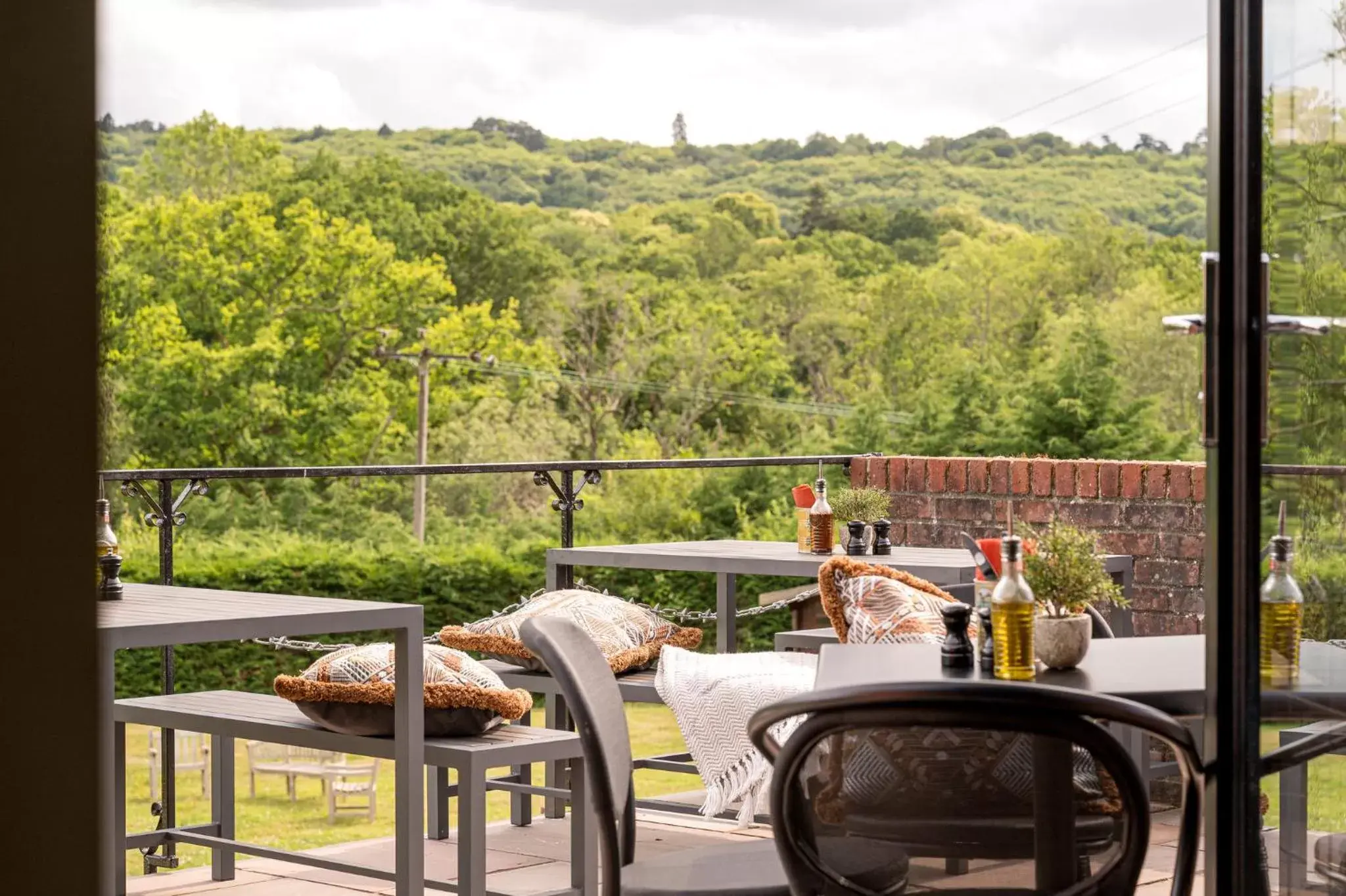 Restaurant/places to eat, Balcony/Terrace in voco Lythe Hill Hotel & Spa, an IHG Hotel