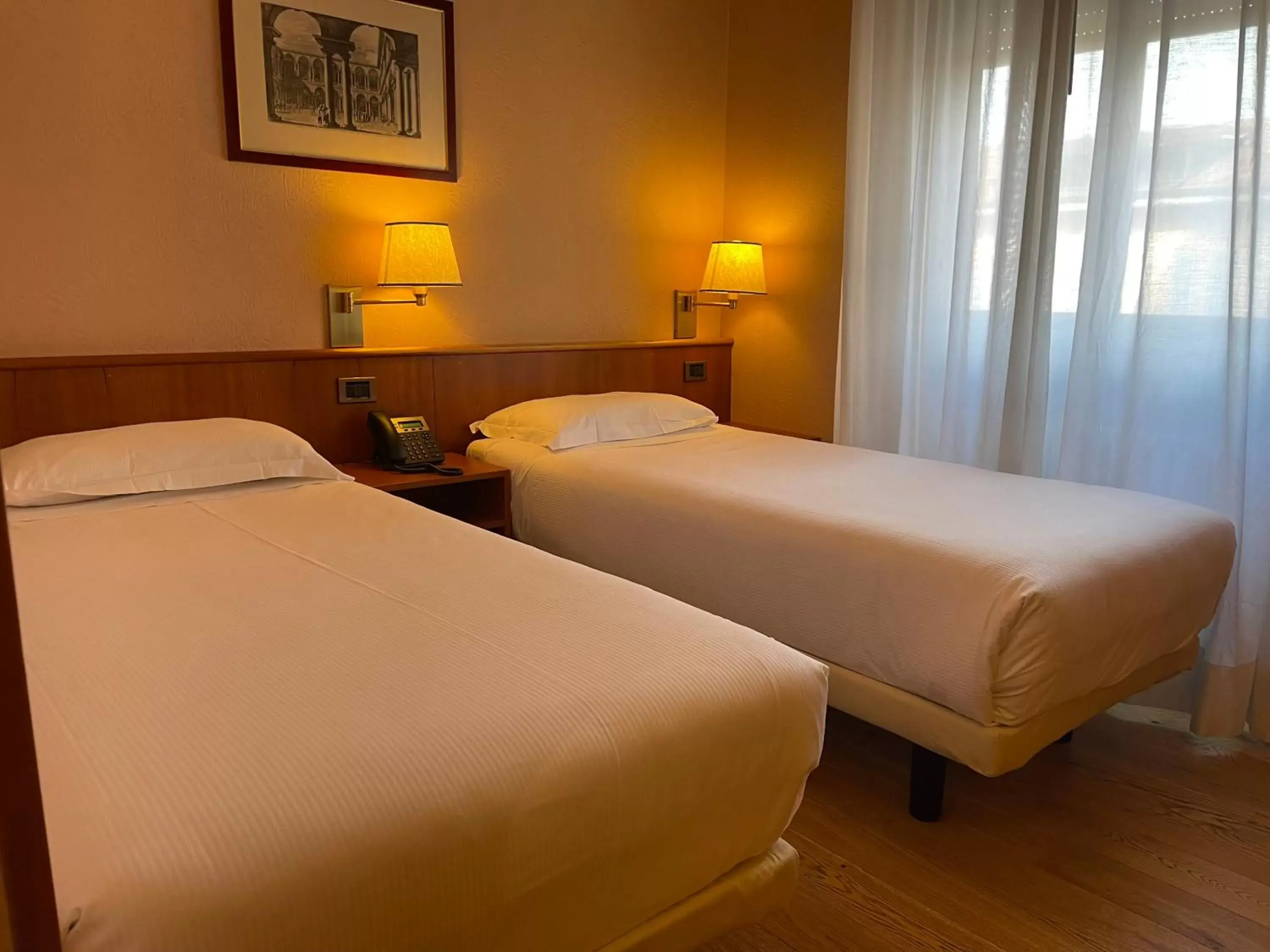 Bed in Crystal Hotel Varese