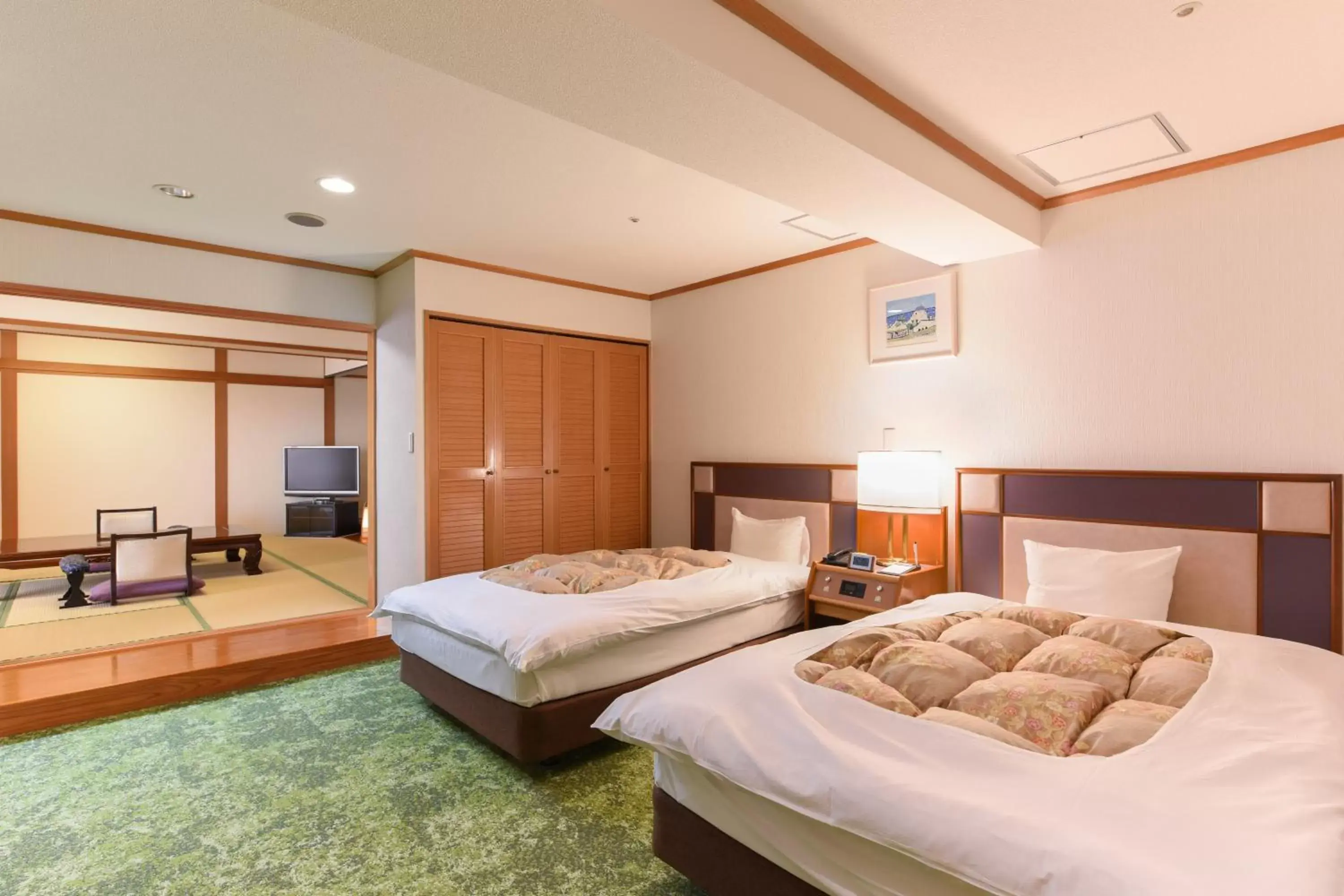 Bed in Ibusuki Kaijo Hotel