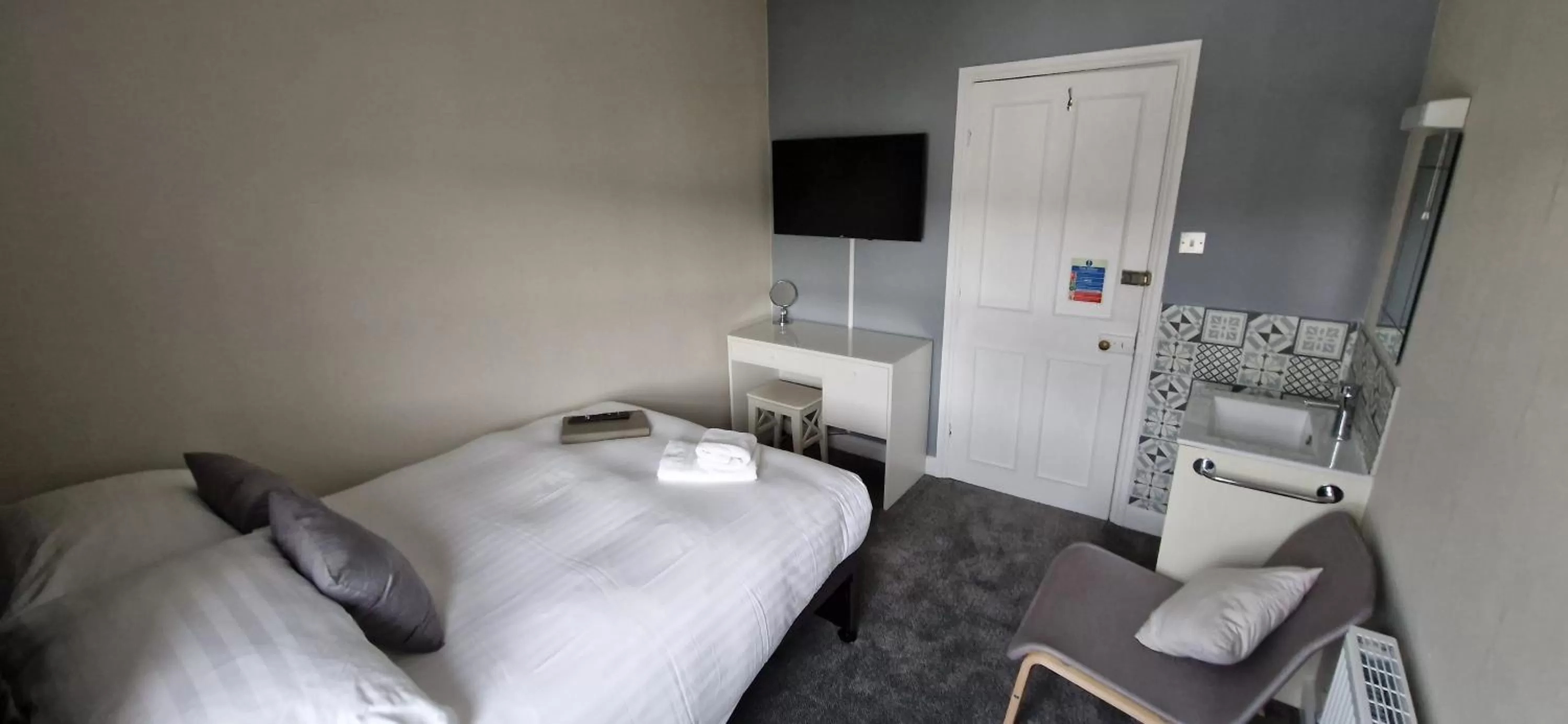 Bed in Glencoe Guest House