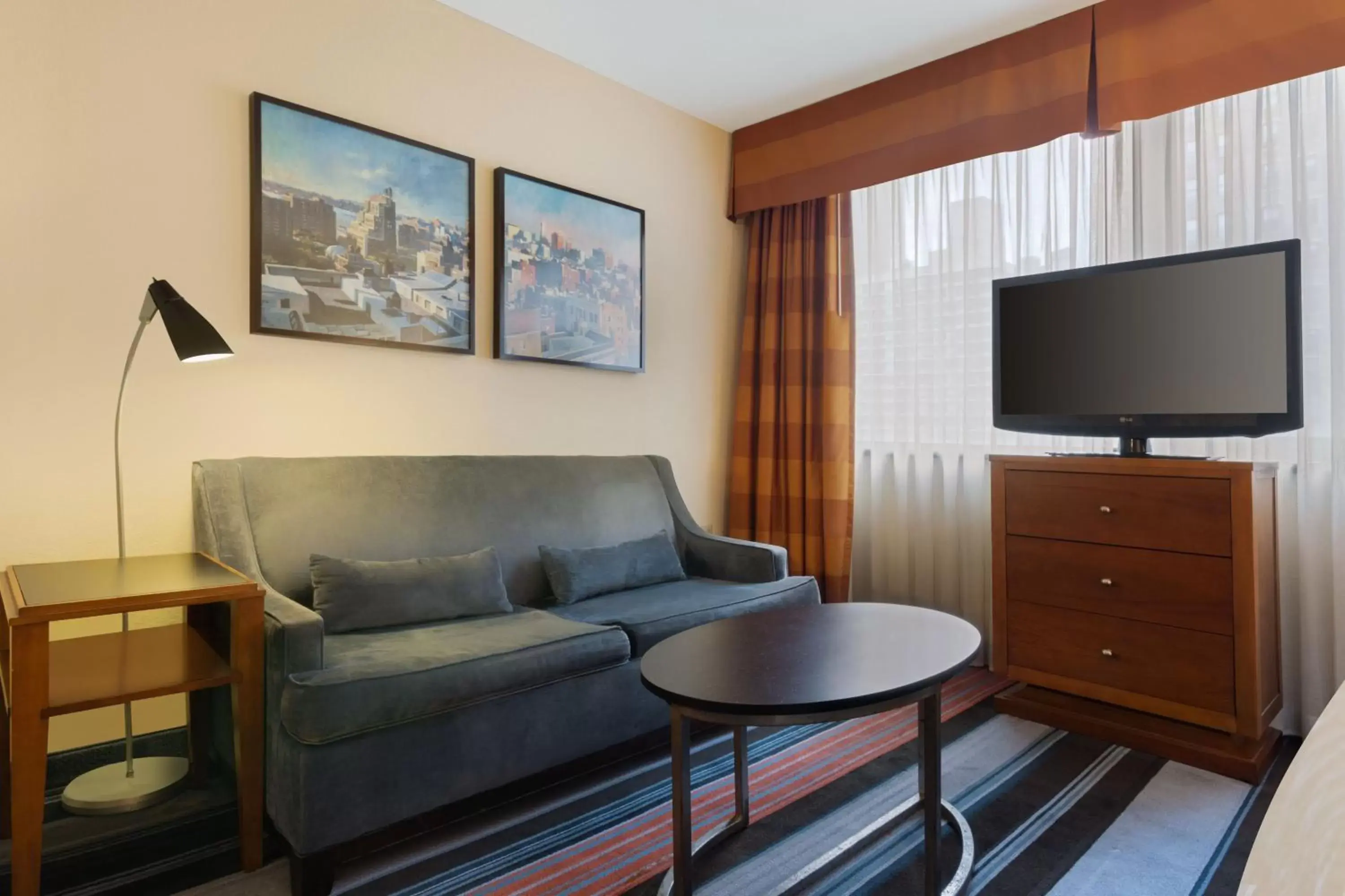 Photo of the whole room, TV/Entertainment Center in Residence Inn by Marriott New York Manhattan/Times Square