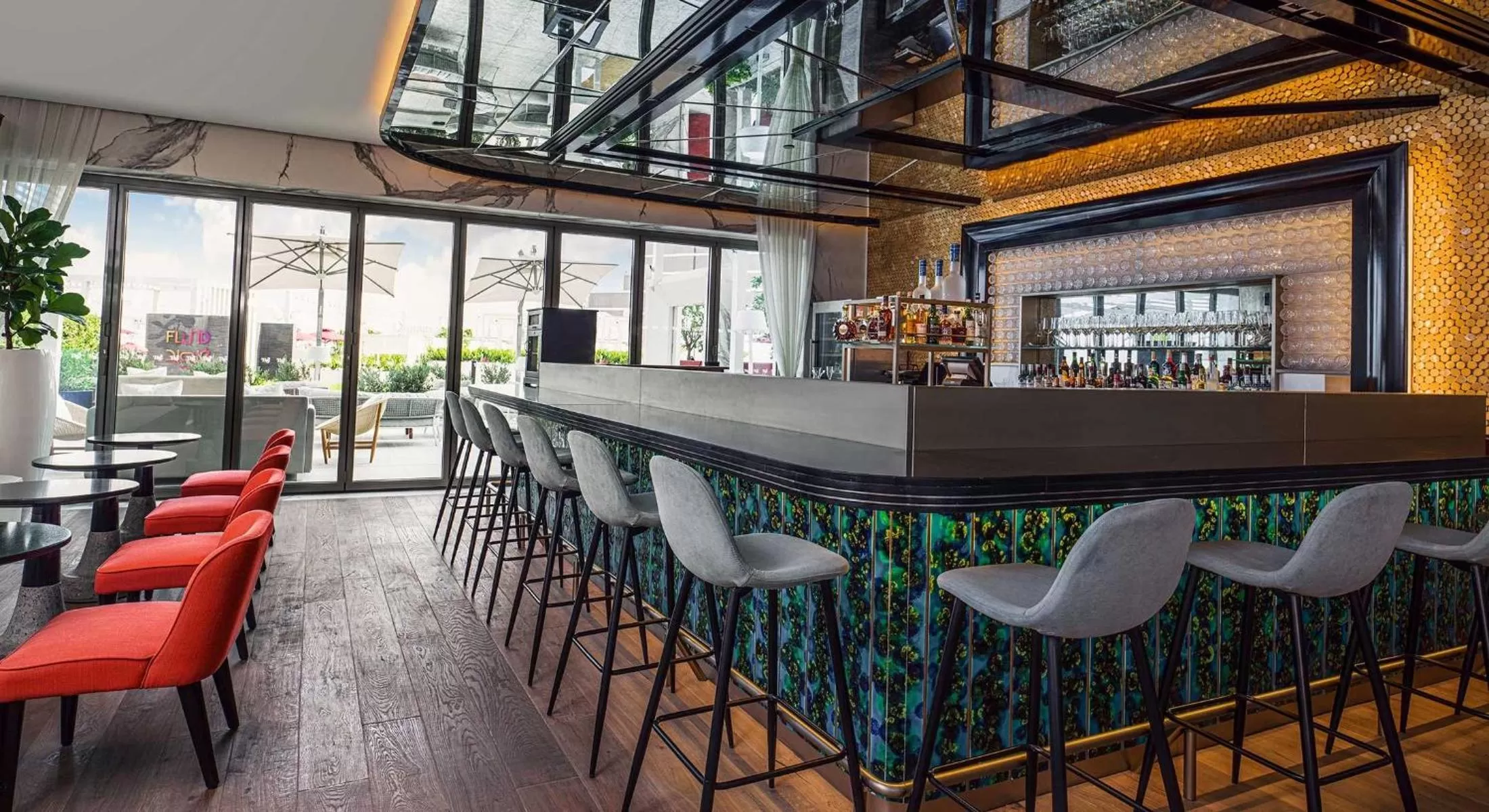 Lounge or bar in Th8 Palm Dubai Beach Resort Vignette Collection, an IHG hotel