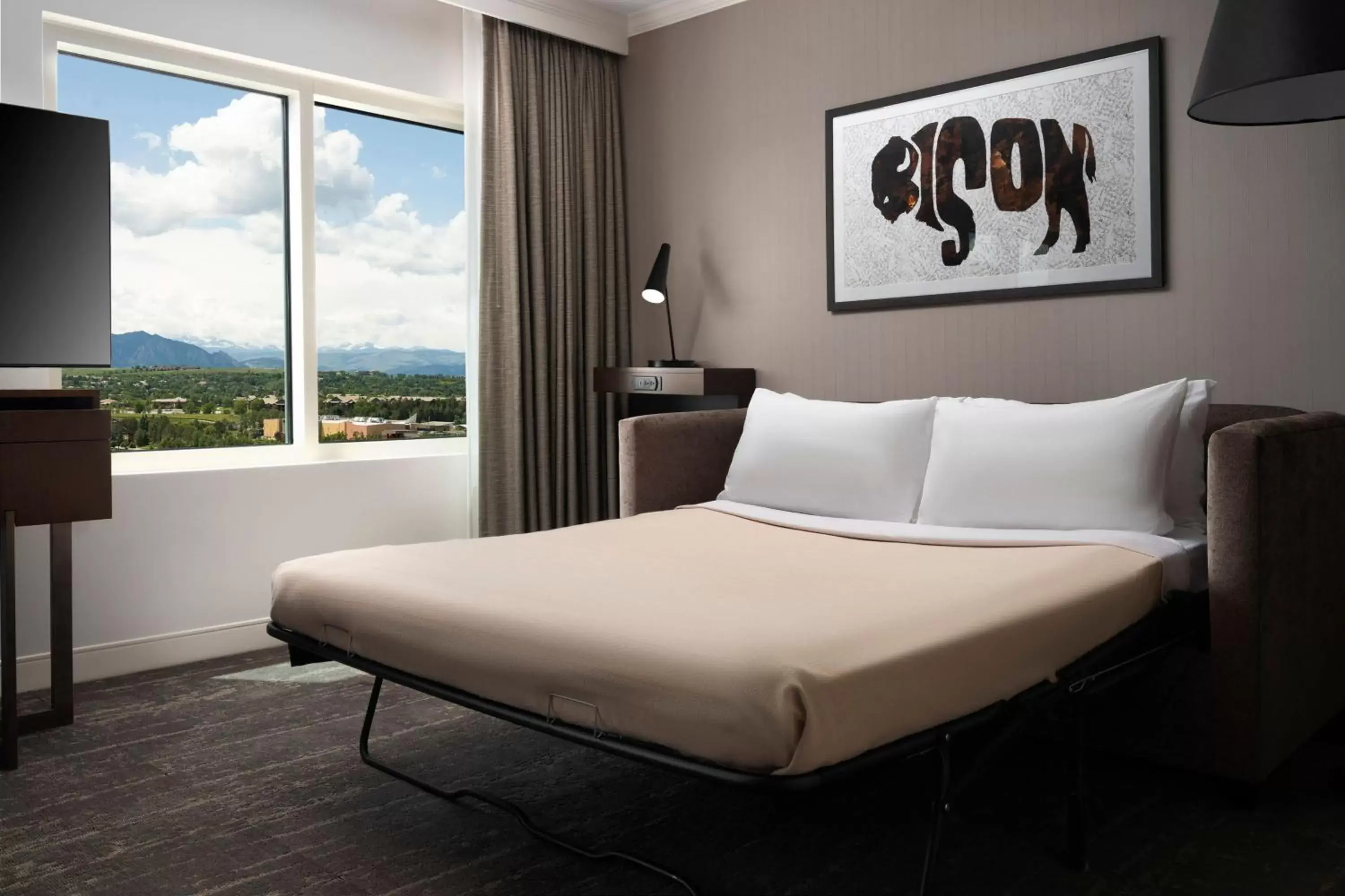 Photo of the whole room, Bed in Renaissance Boulder Flatiron Hotel