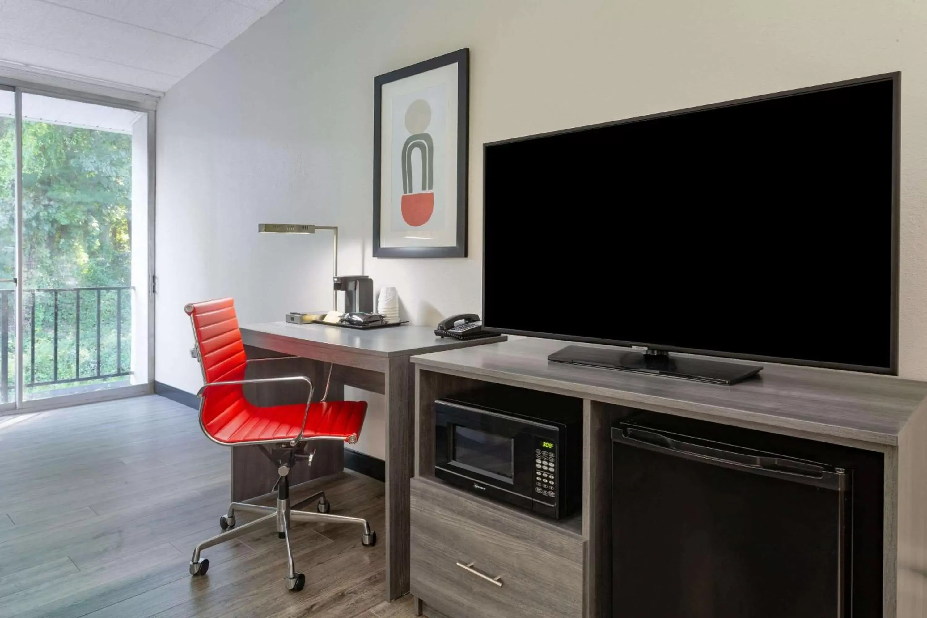 Photo of the whole room, TV/Entertainment Center in Ramada by Wyndham Windsor Locks