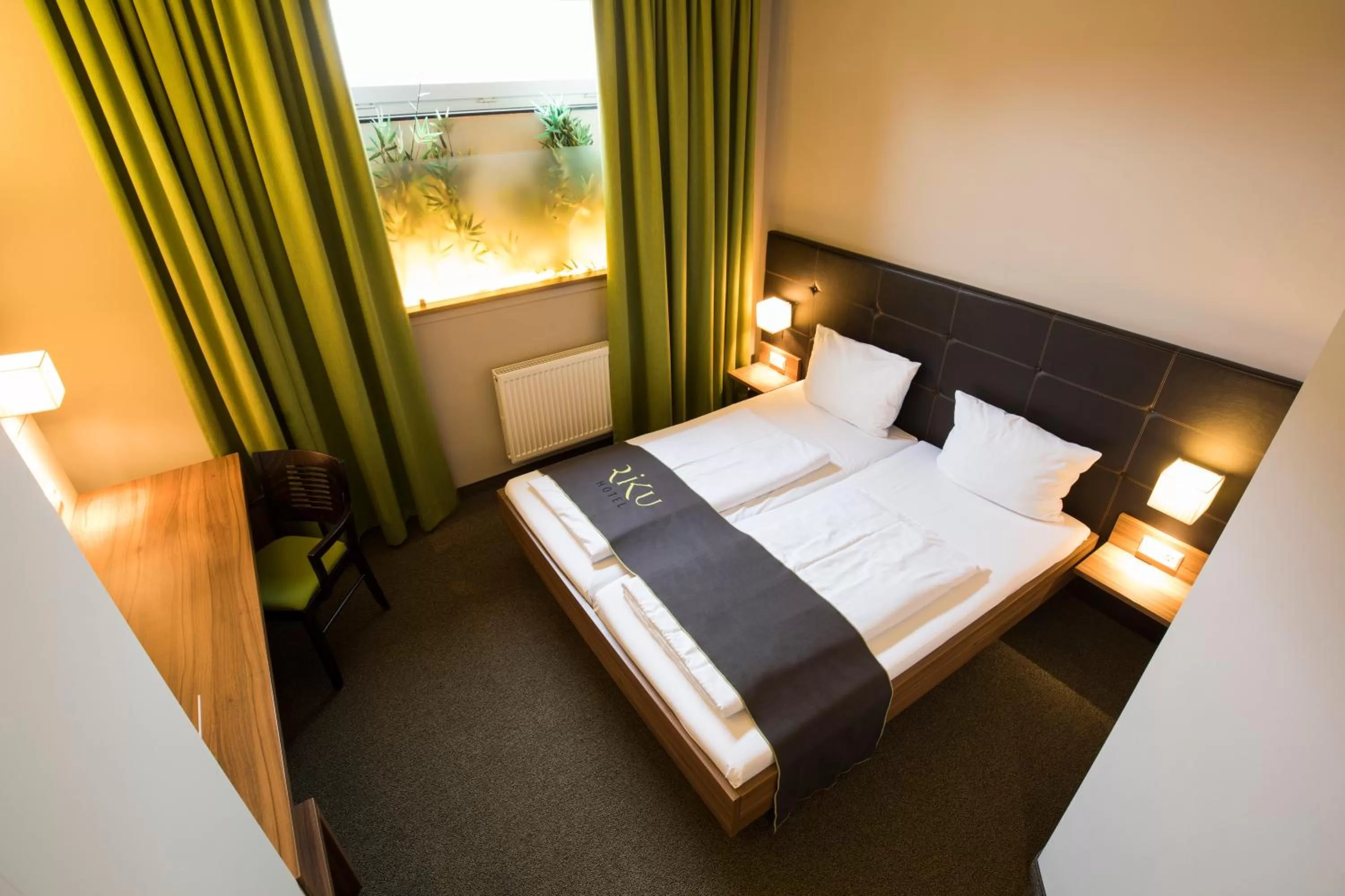 Photo of the whole room, Bed in RiKu HOTEL Neu-Ulm